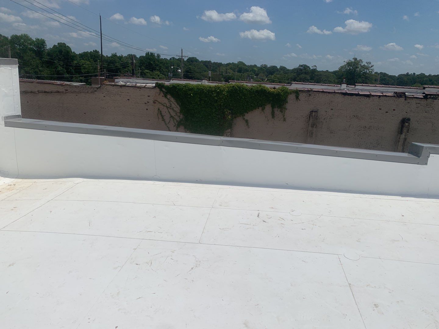 Commercial Roofing Installation in DeQueen, AR, using 50 mil PVC by Hostetler Roofing