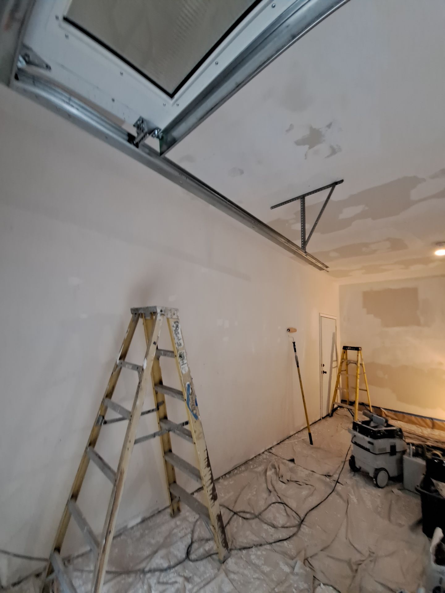 Garage dry wall repair/ re-texture, re-paint by Gordon Painting