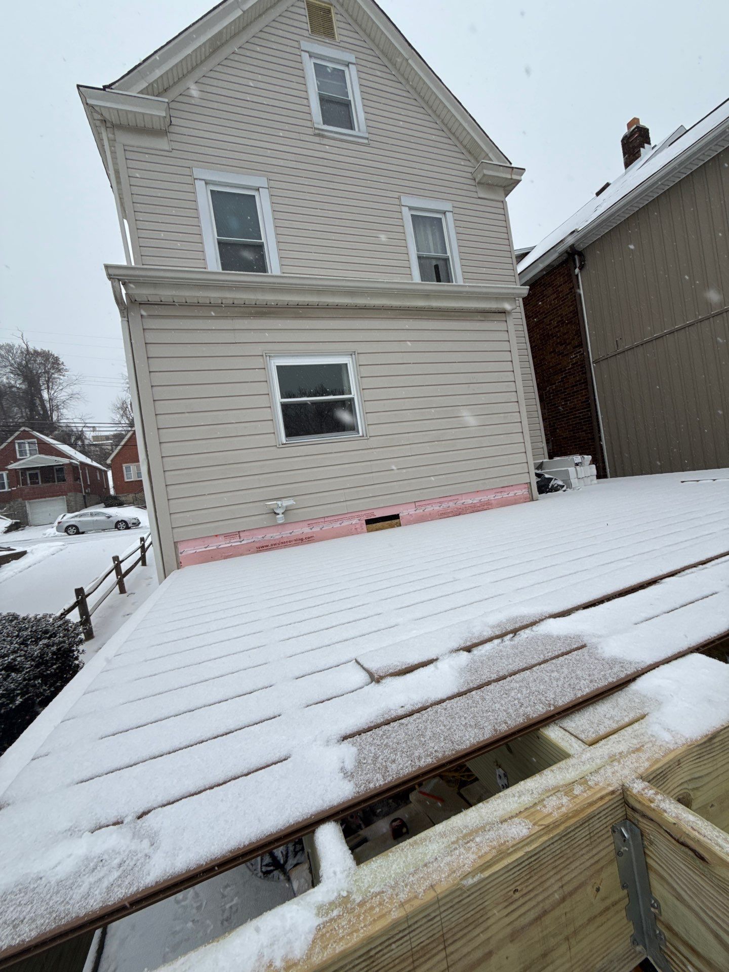 Deck and door by Cousins Roofing Siding & Decks