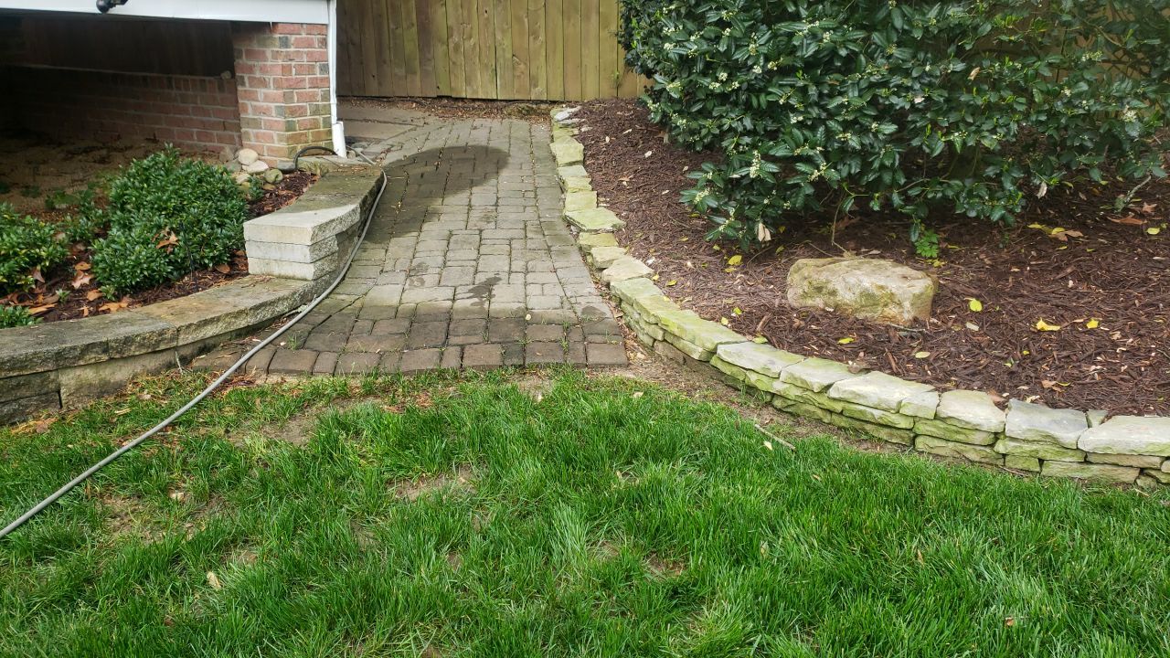 patio cleaning using cleaner by Power Wash Masters LLC