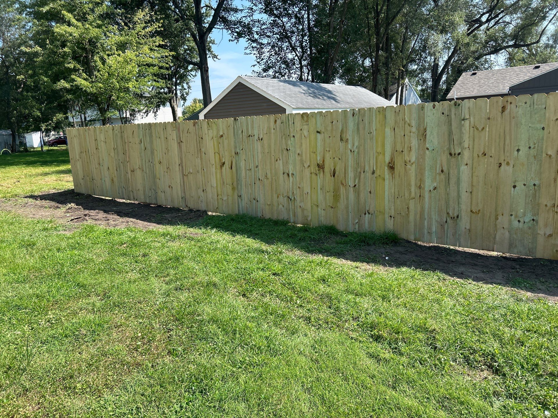 Treated Pine Privacy and Picket Fence Installation in Evansdale by Perfect Picket Fence and Stain
