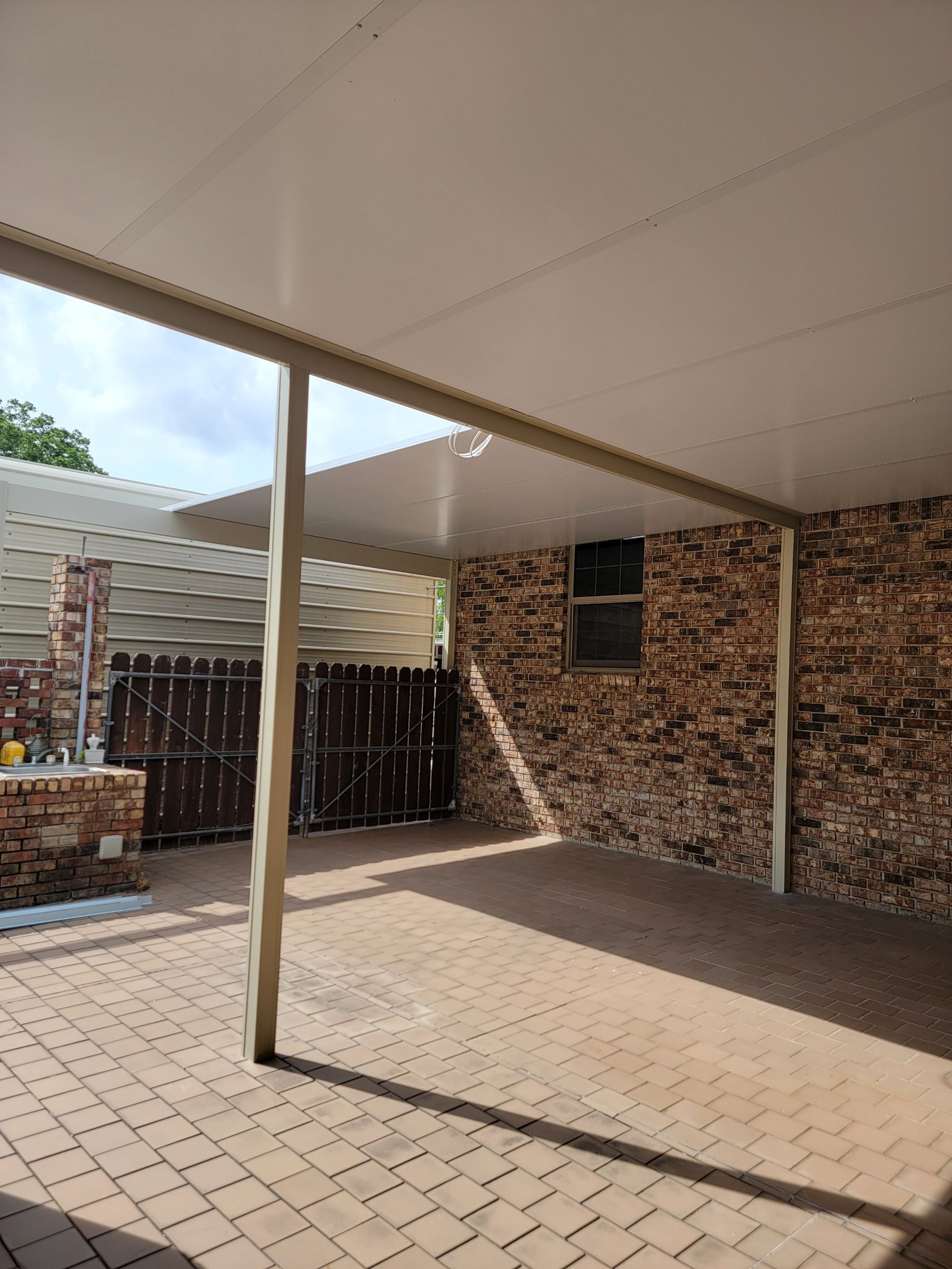 Patio Cover using Colorbeam by Titan Sunrooms