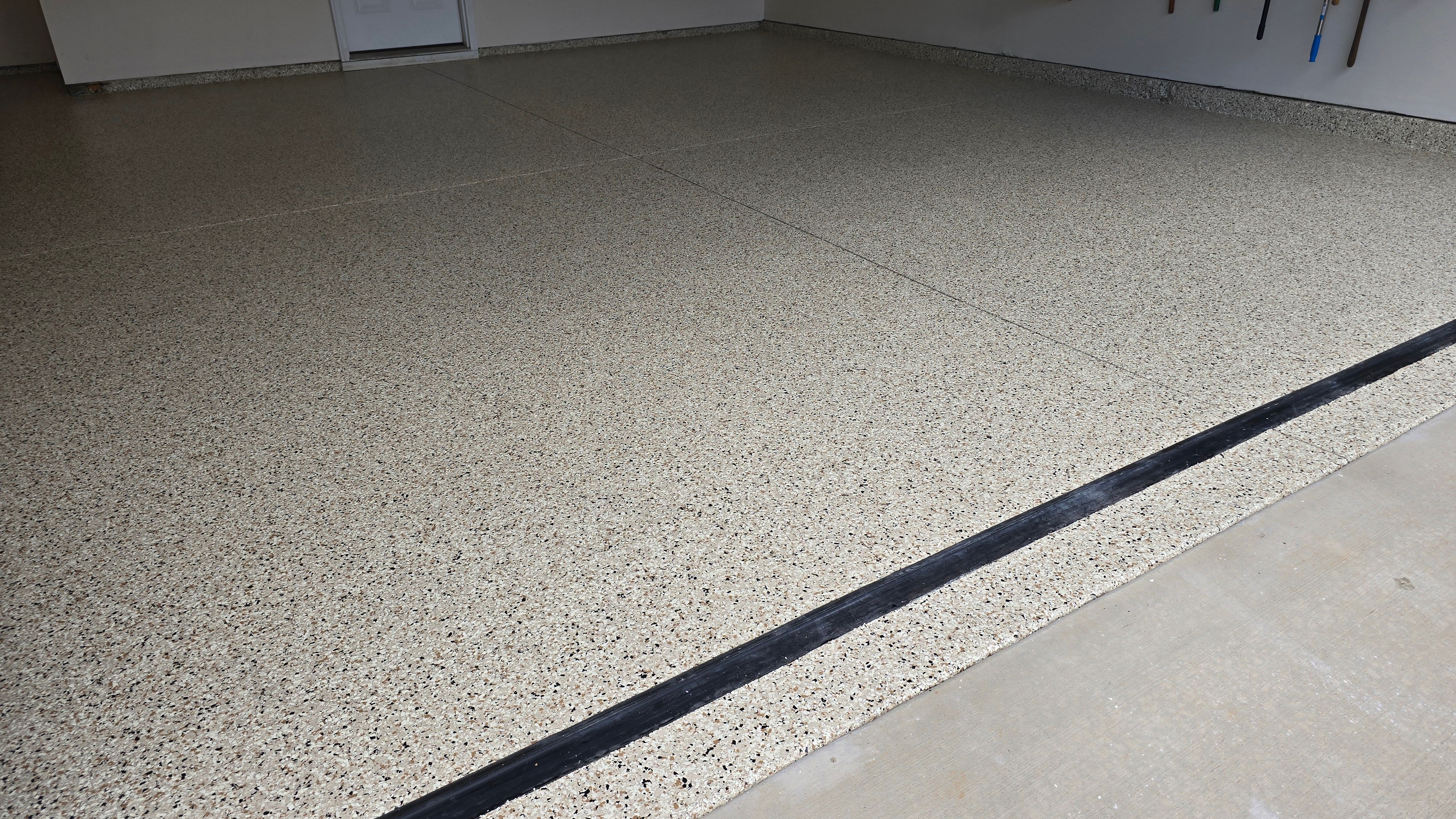 Garage & Back Porch Using Shoreline & Coyote by Elite Floor Solutions