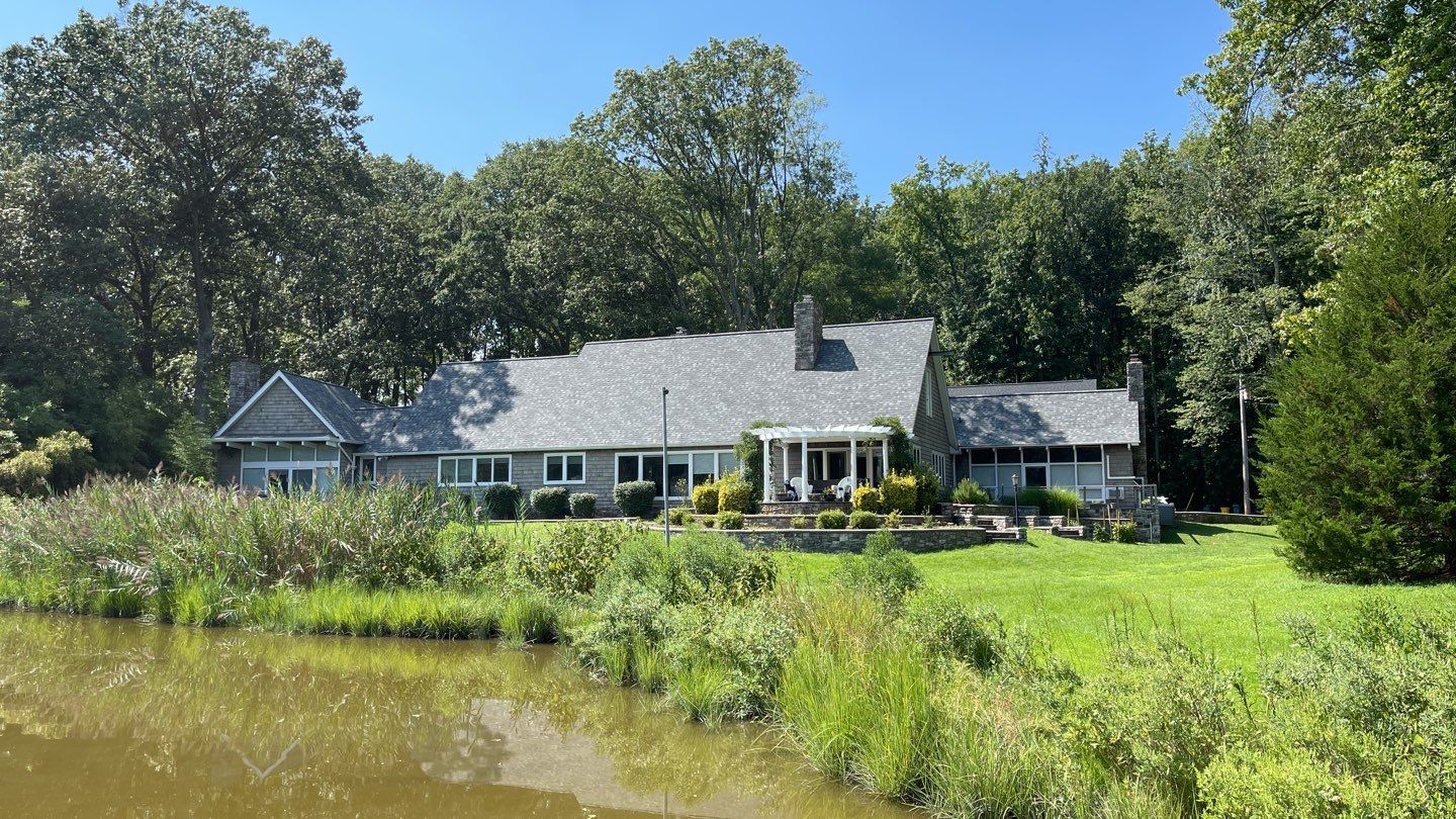 Roof Replacement using IKO Dynasty by American Home Contractors