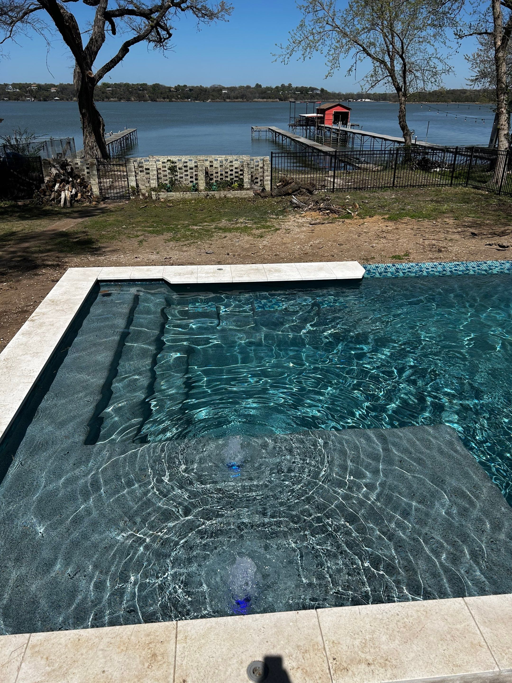 Lakefront Geometric Pool with Tanning Ledge by Pinnacle Pools and Spas - DFW