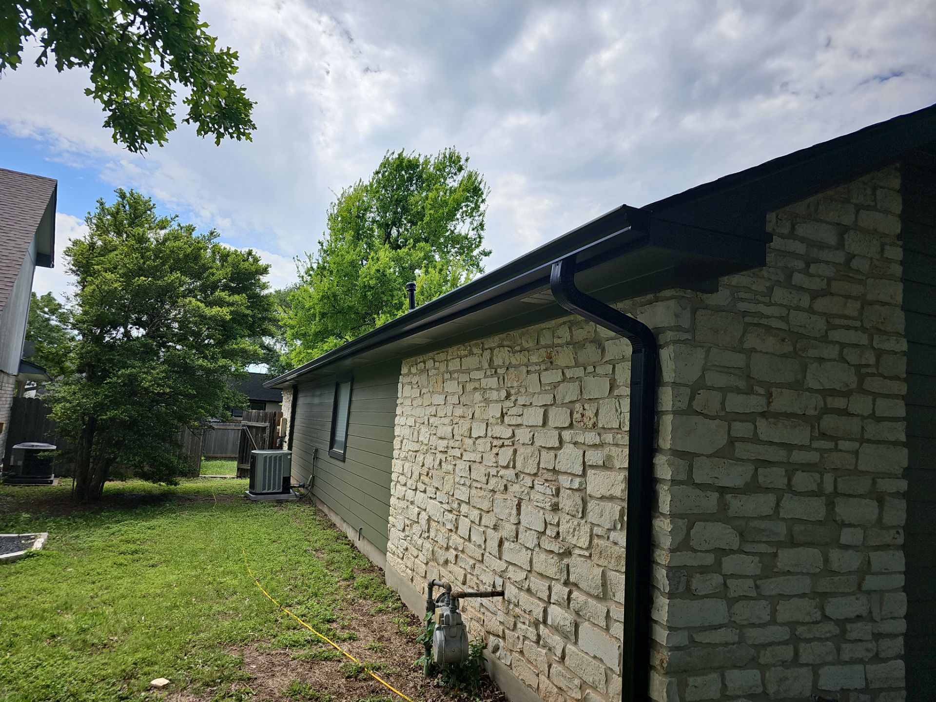 Residential Roofing Installation using Owens Corning Oakridge Onyx Black by DeZign Roofing & Exteriors