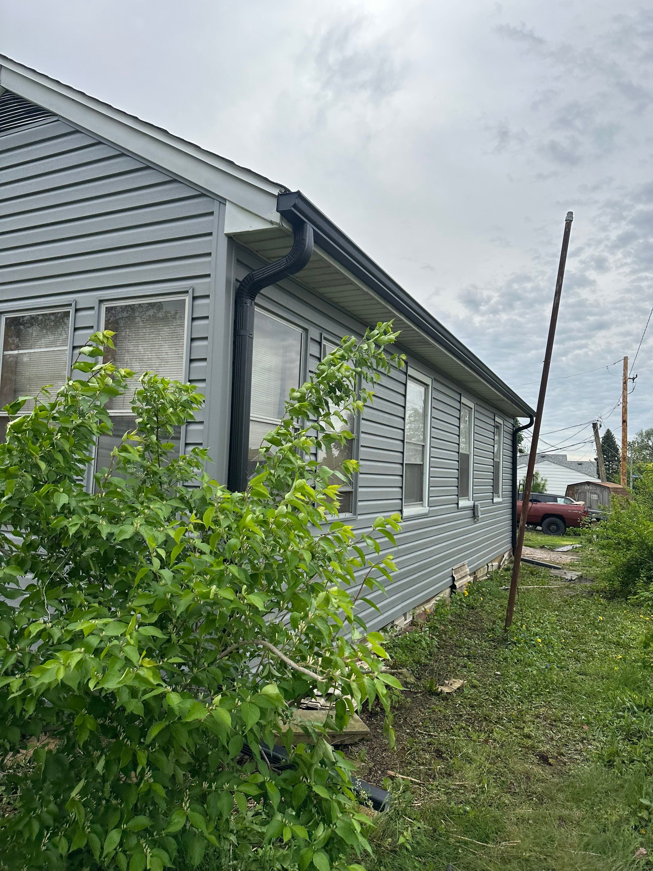 Siding replacement by Optimal Home Improvement 
