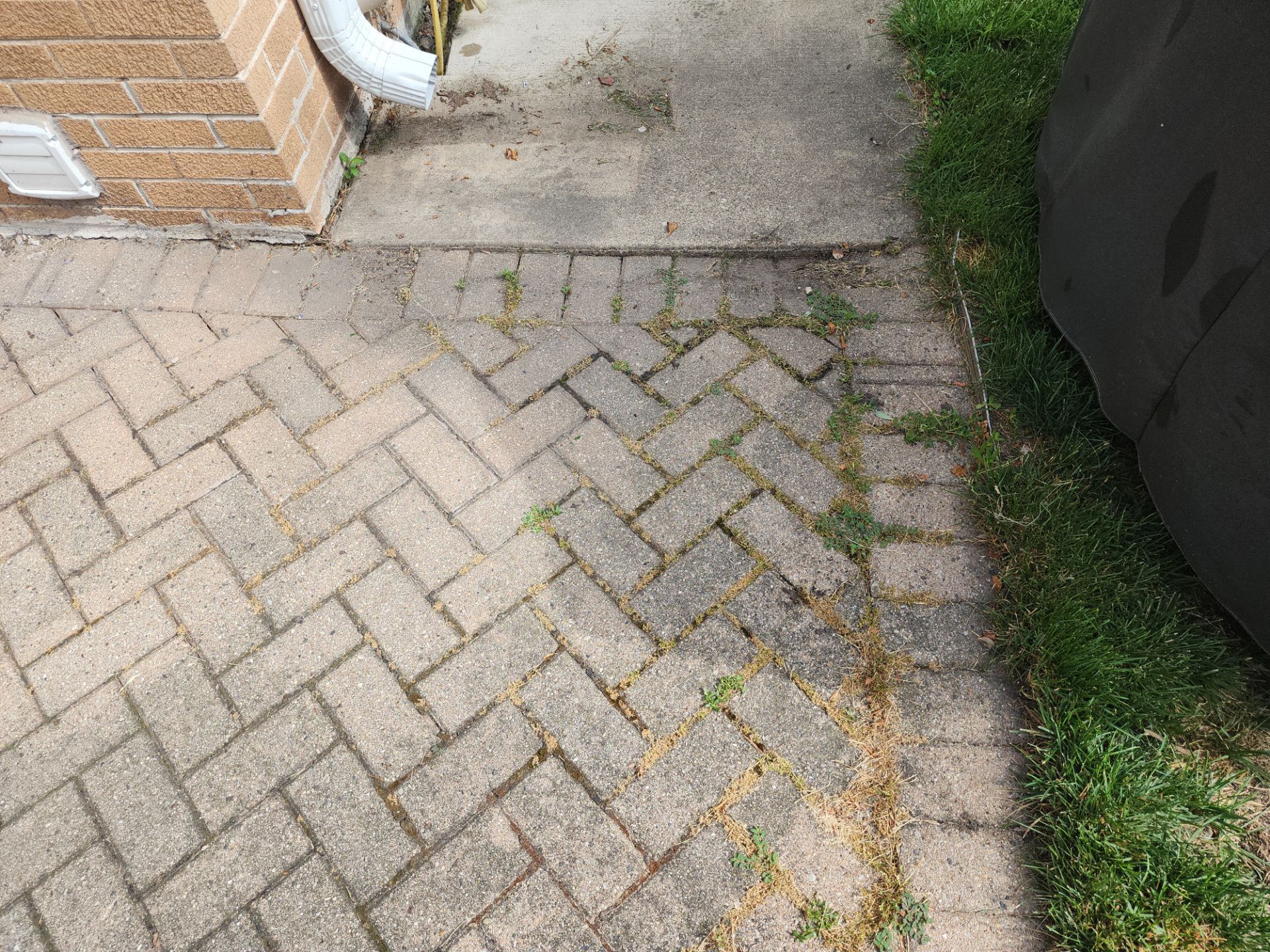 Brick paver cleaning  by Northern Power Washing LLC.