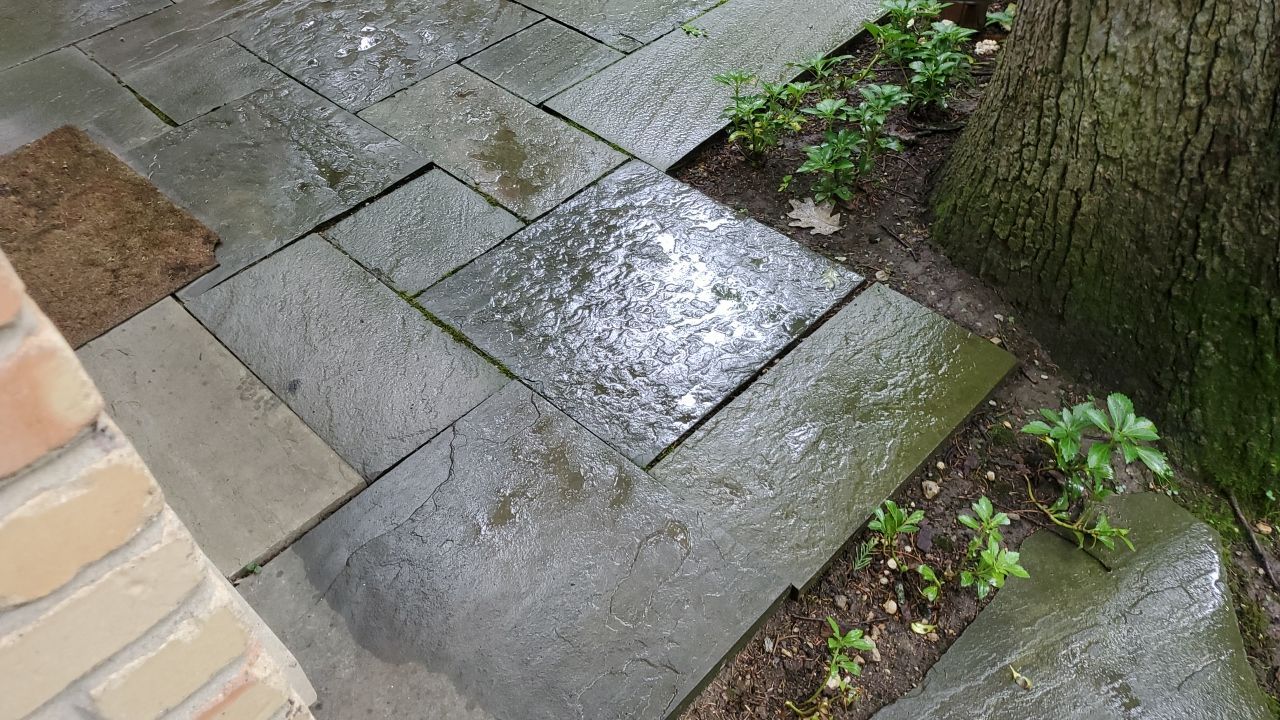 Bluestone patio cleaning by Northern Power Washing LLC.