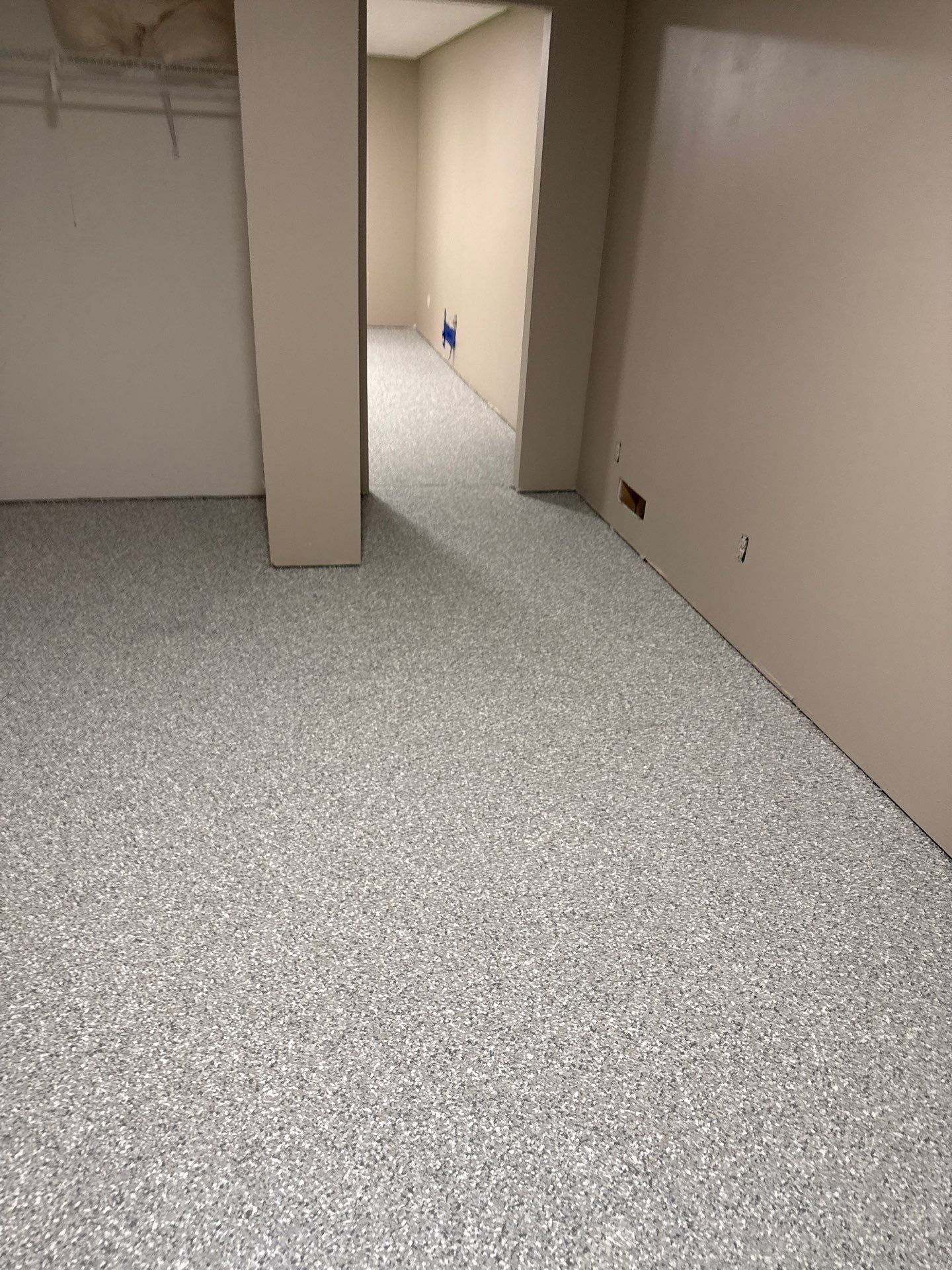 Basement Concrete Coating with Speckled Flake Finish in Elkhart by Revival Concrete Coatings
