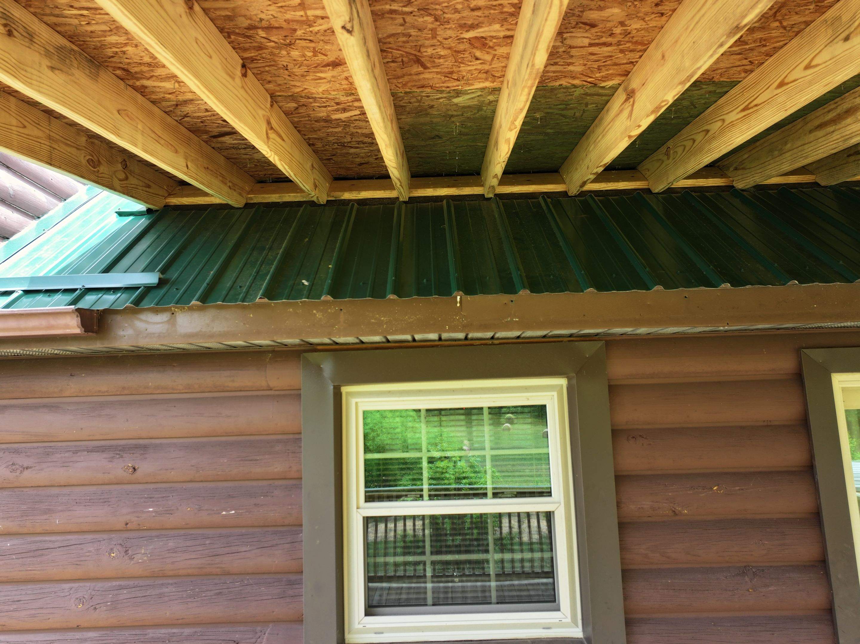 Paddle Creek Pet Ranch Cabin  by Omnia Roofing