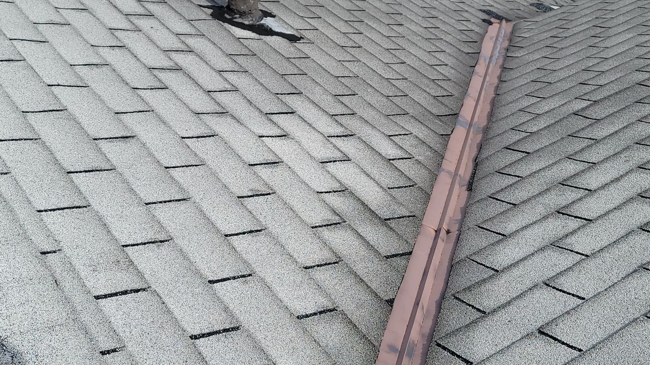 ATLAS PINNACLE COLOR: HEARTHSTONE DRIP EDGE: WHITE by Eagle Eye Roofing