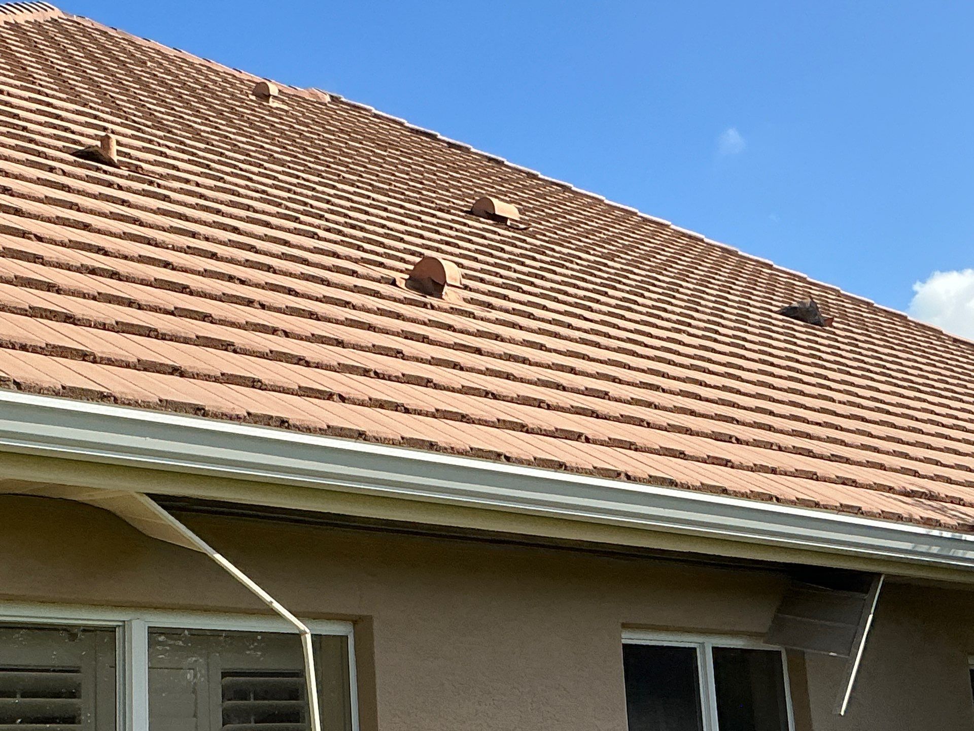 White Soffit and Fascia Installation for Coastal Homes in Sarasota FL by Gutter Professors