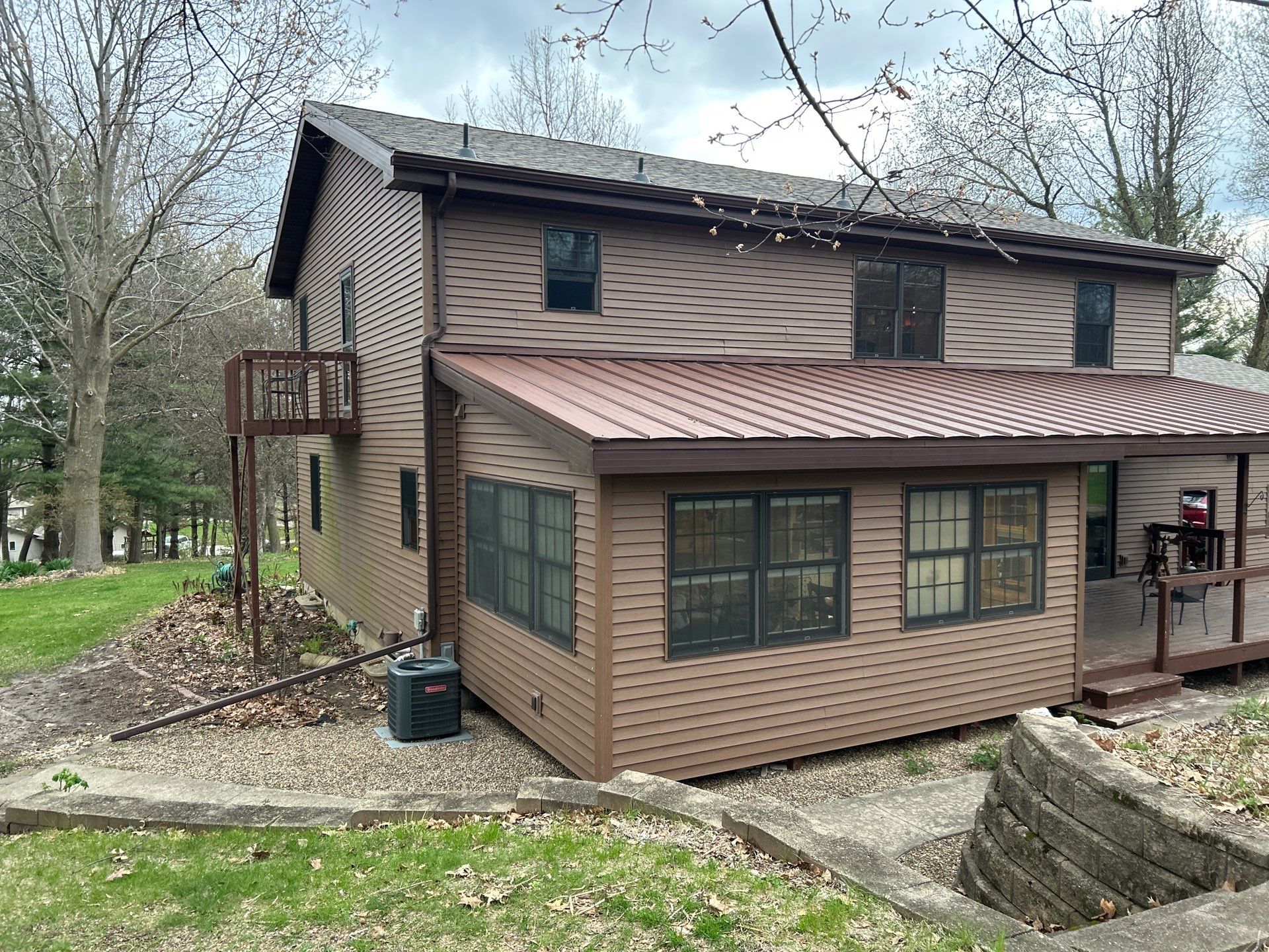 Pella Window installation using Pella Lifestyle wood/Aluminum window by United Windows and Siding LLC