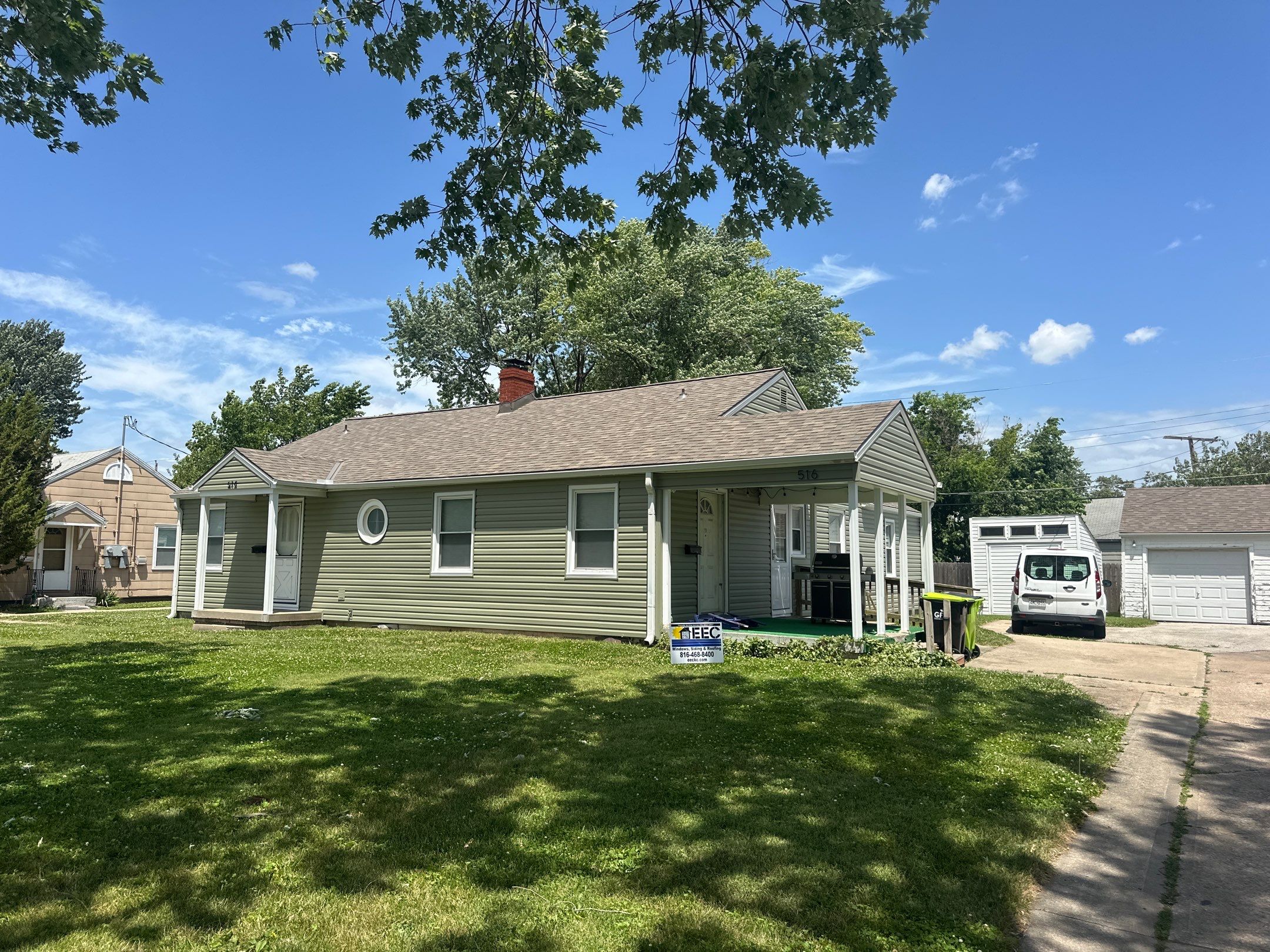 New Cypress Siding going on this North Kansas City Home  by EEC  Windows, Siding & Roofing 