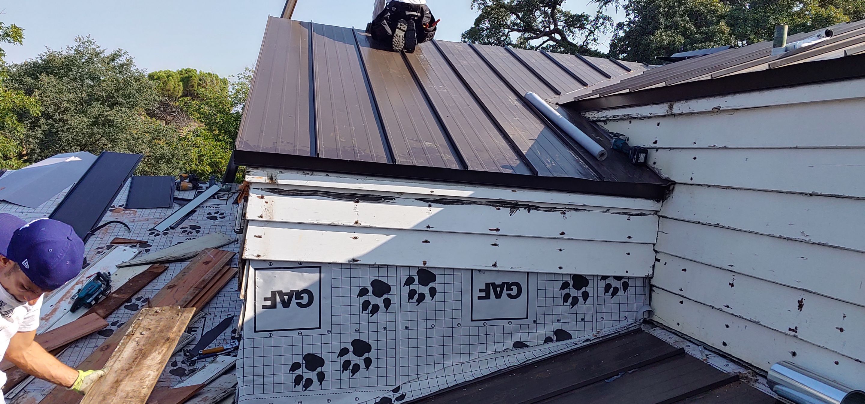 Residential Roofing Installation using Standing seam metal roofing system by Straight Edge Roofing Inc