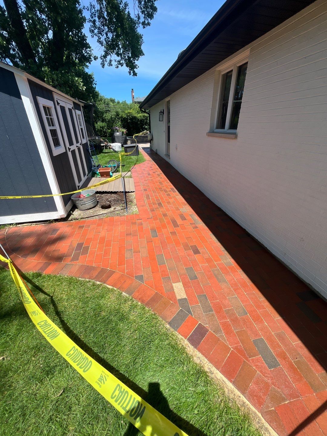 Brick paver repair, cleaning and sealing by Northern Power Washing LLC.