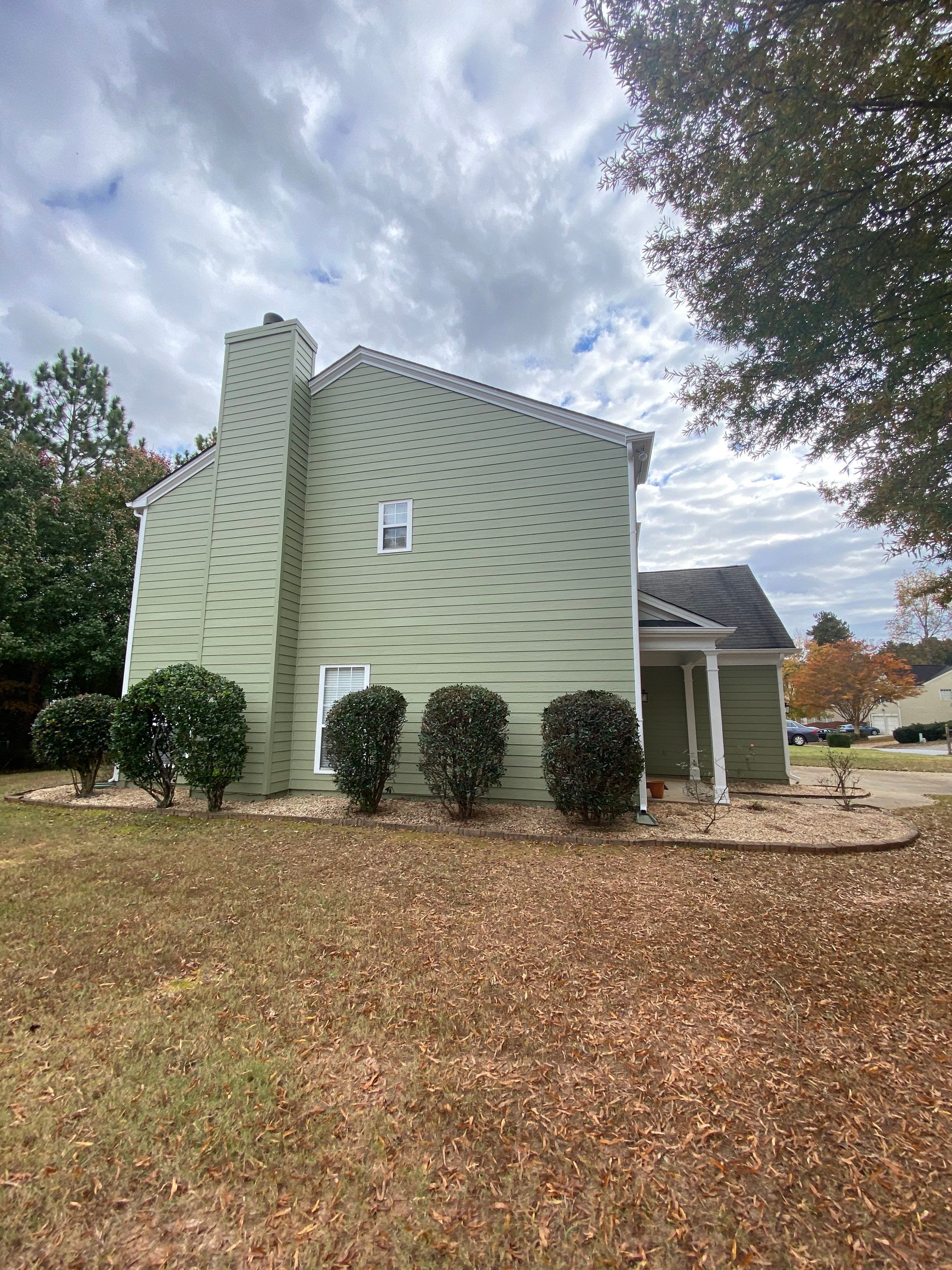 Exterior Painting for a Two-Story Sage Green Home in Kennesaw by Swift Home Renovations