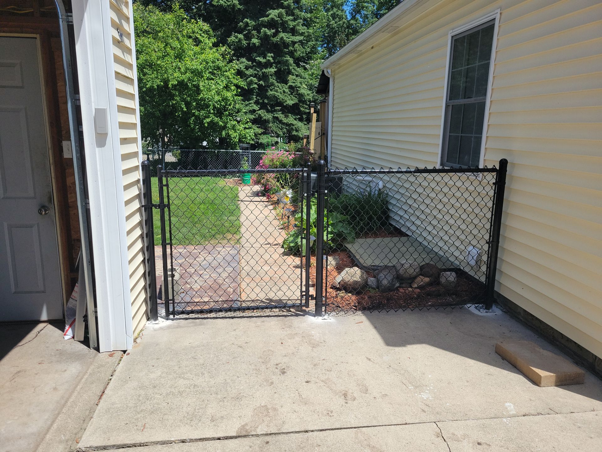 Custom Cedar Unstained Wood Privacy Fence Installation in Cedar Falls by Perfect Picket Fence and Stain