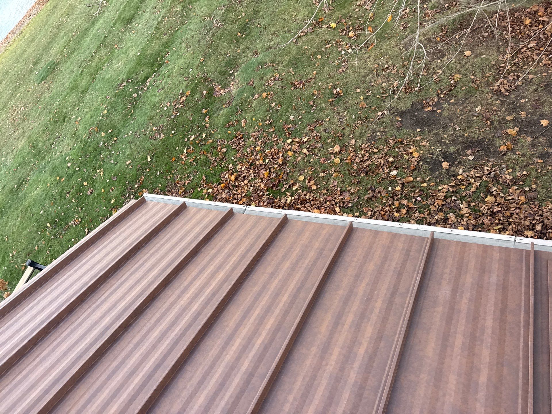 Roof Replacement using MS Standing Seam Roof Western Rust by 180 Contractors