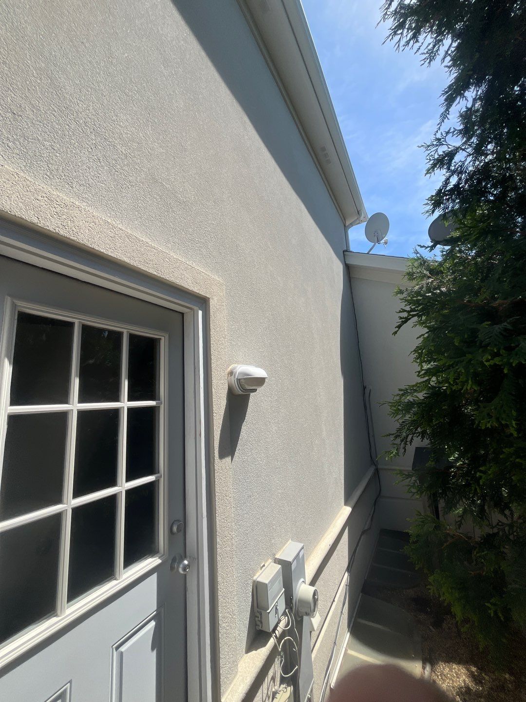 dryvit using Algaecide, soft wash soap by Northern Power Washing LLC.