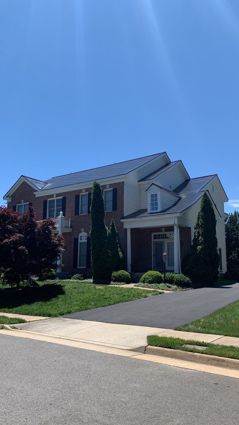 Tesla Solar Roof Replacement using Tesla Solar Roof V3 tiles by American Home Contractors