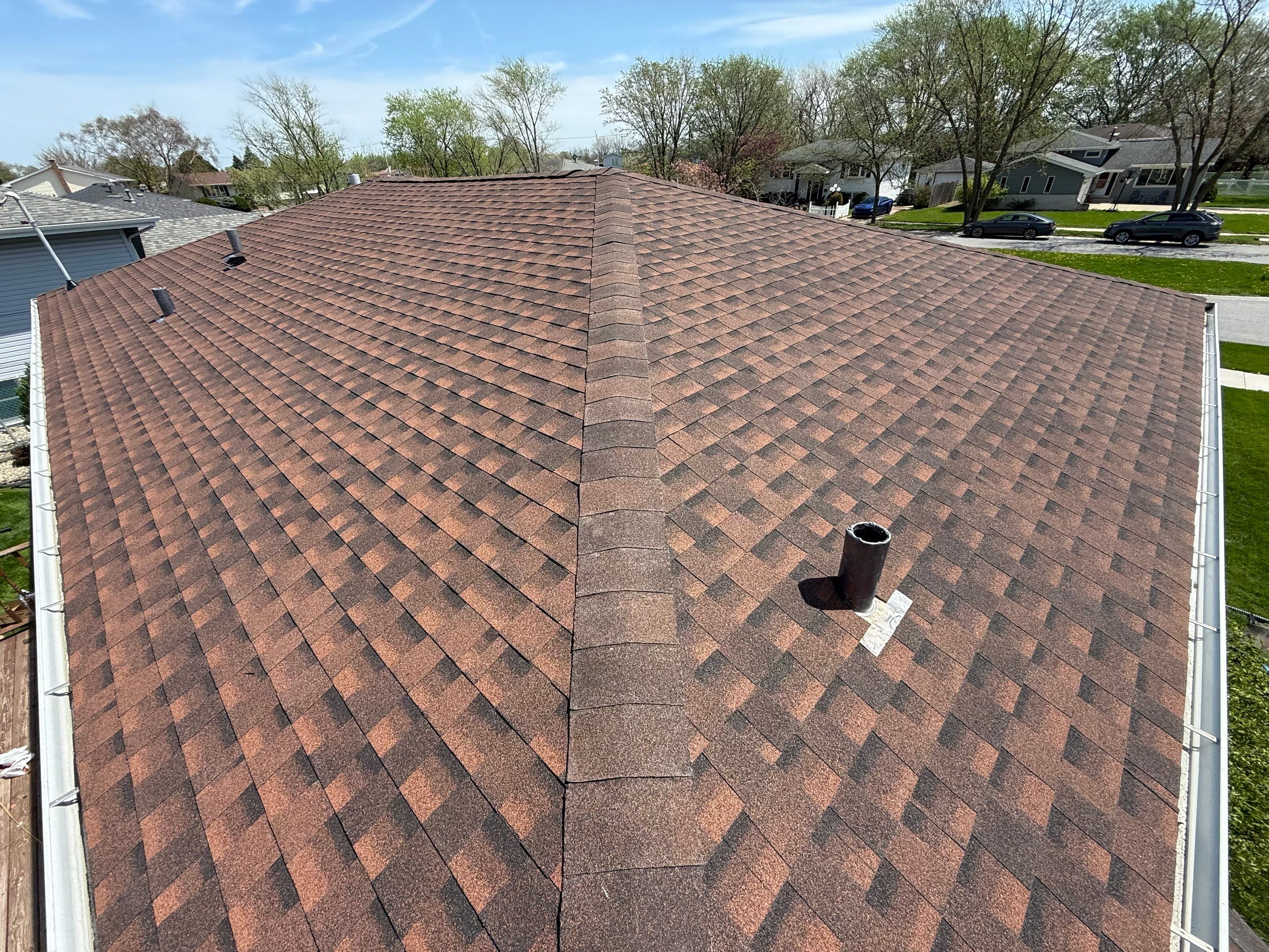 House and garage roof replacement by Optimal Home Improvement 