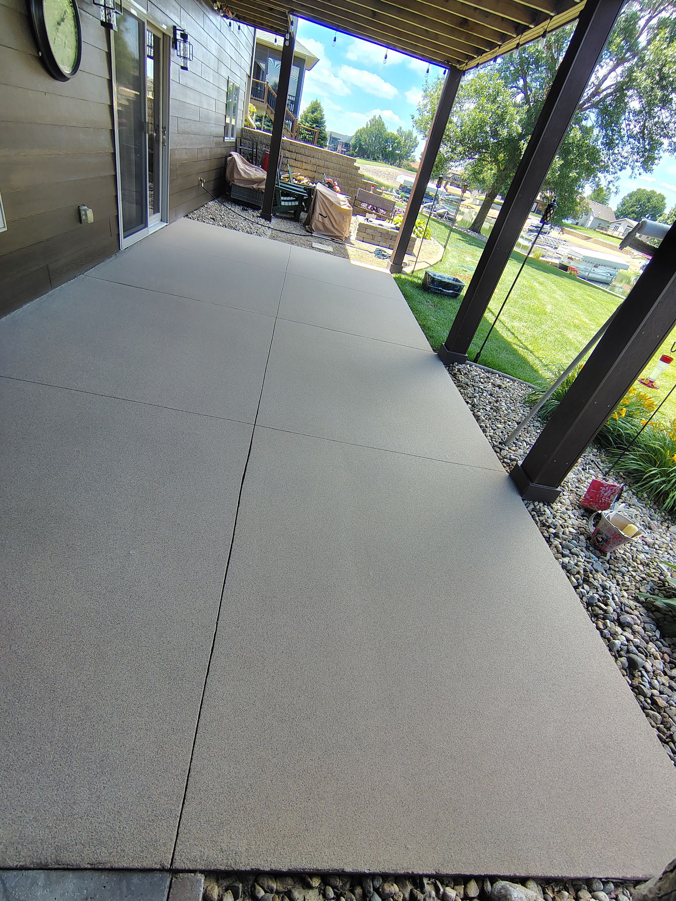 Textured Concrete Coating and Entryway Restoration in Madison by Select Painting, Coatings & Garage Cabinets