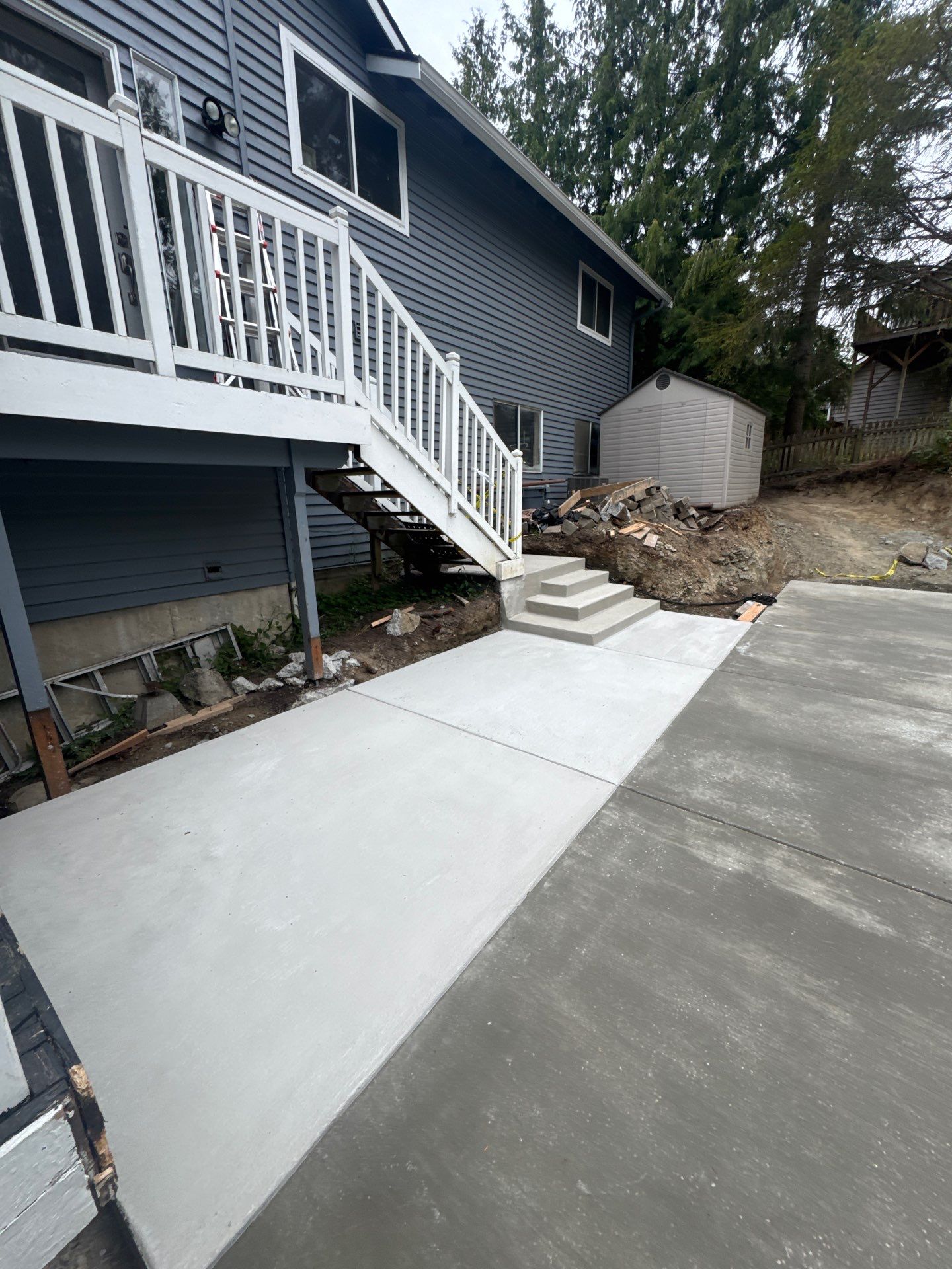 Concrete Back Patio Makeover  by Jireh Asphalt & Concrete Inc 