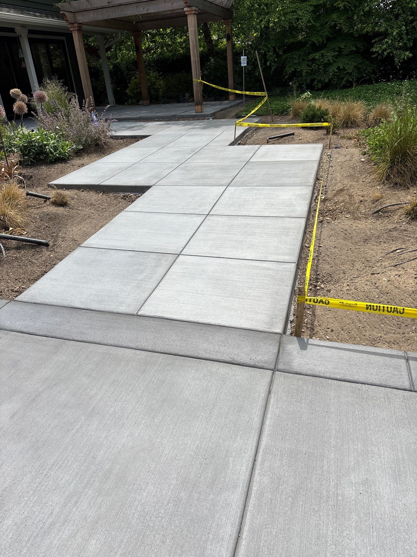 Concrete Driveway Makeover | Edmonds  by Jireh Asphalt & Concrete Inc 
