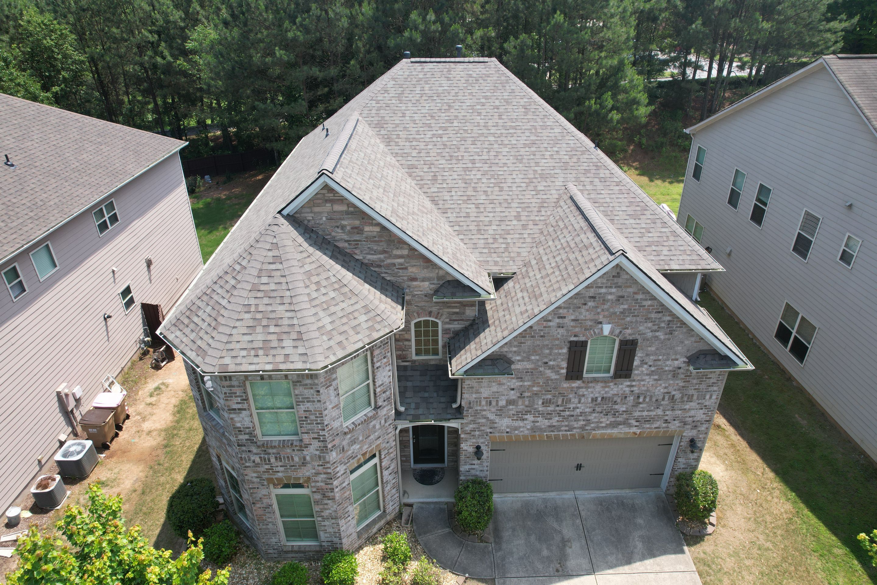 Residential Roof Replacement using Owens Corning TruDef Driftwood by Inspector Roofing and Restoration