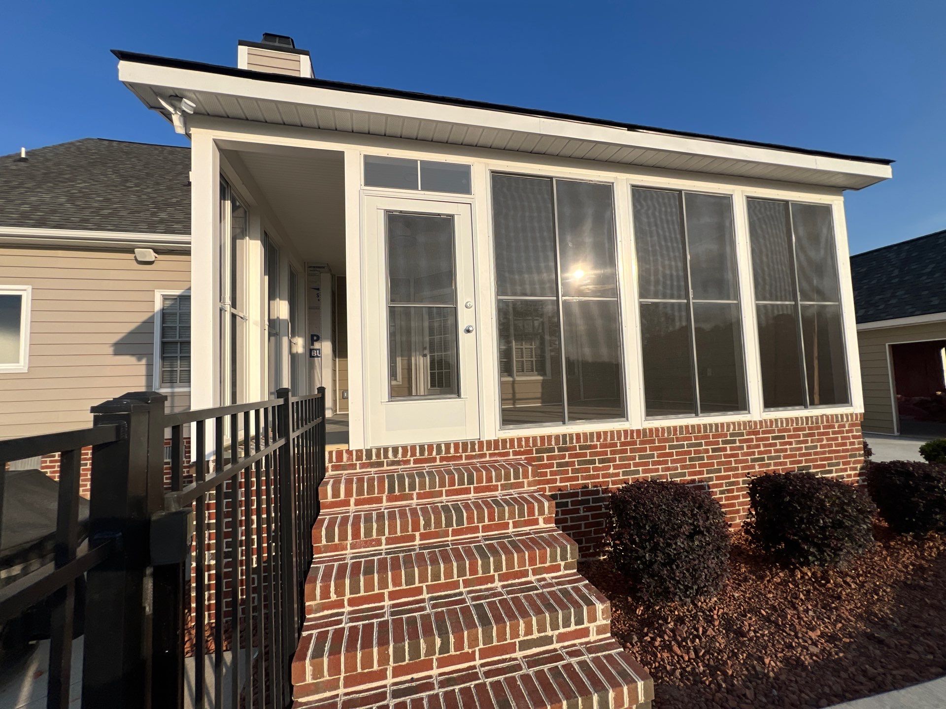 Custom Screened Porch and Concrete Walkway Installation in Rocky Mount by The Remodeling Company
