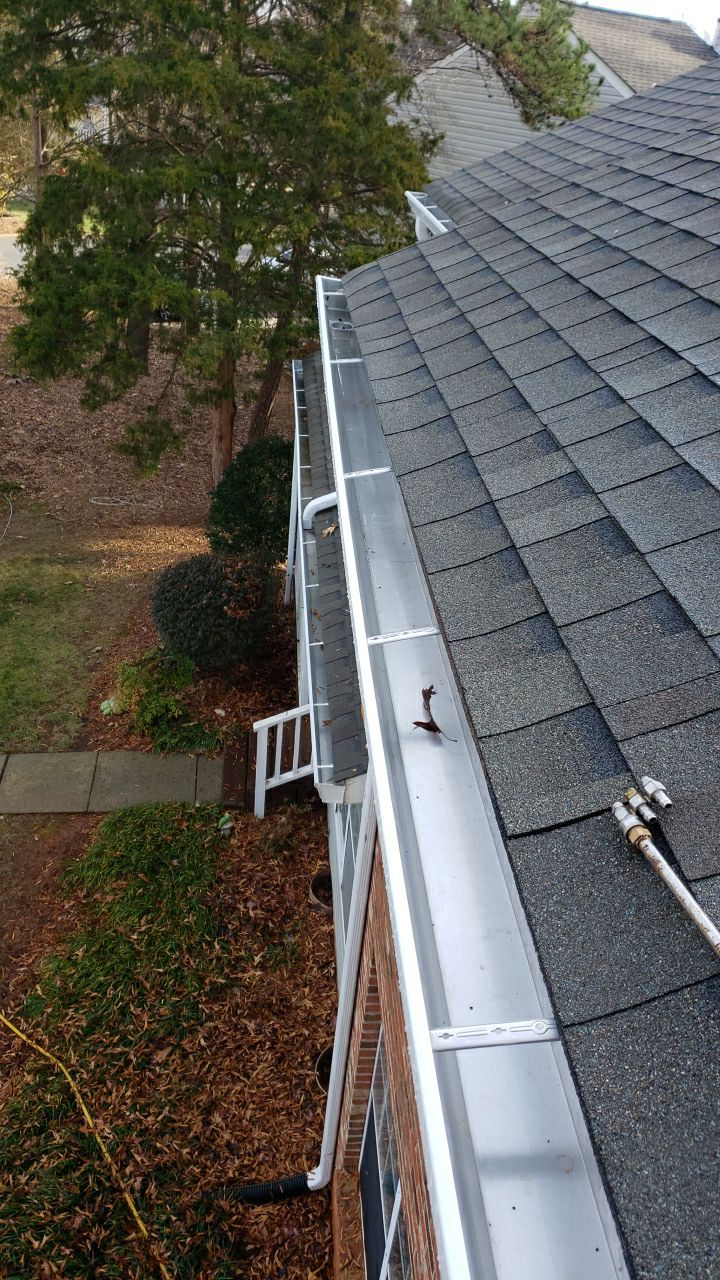 Gutter Cleaning using water by Power Wash Masters LLC