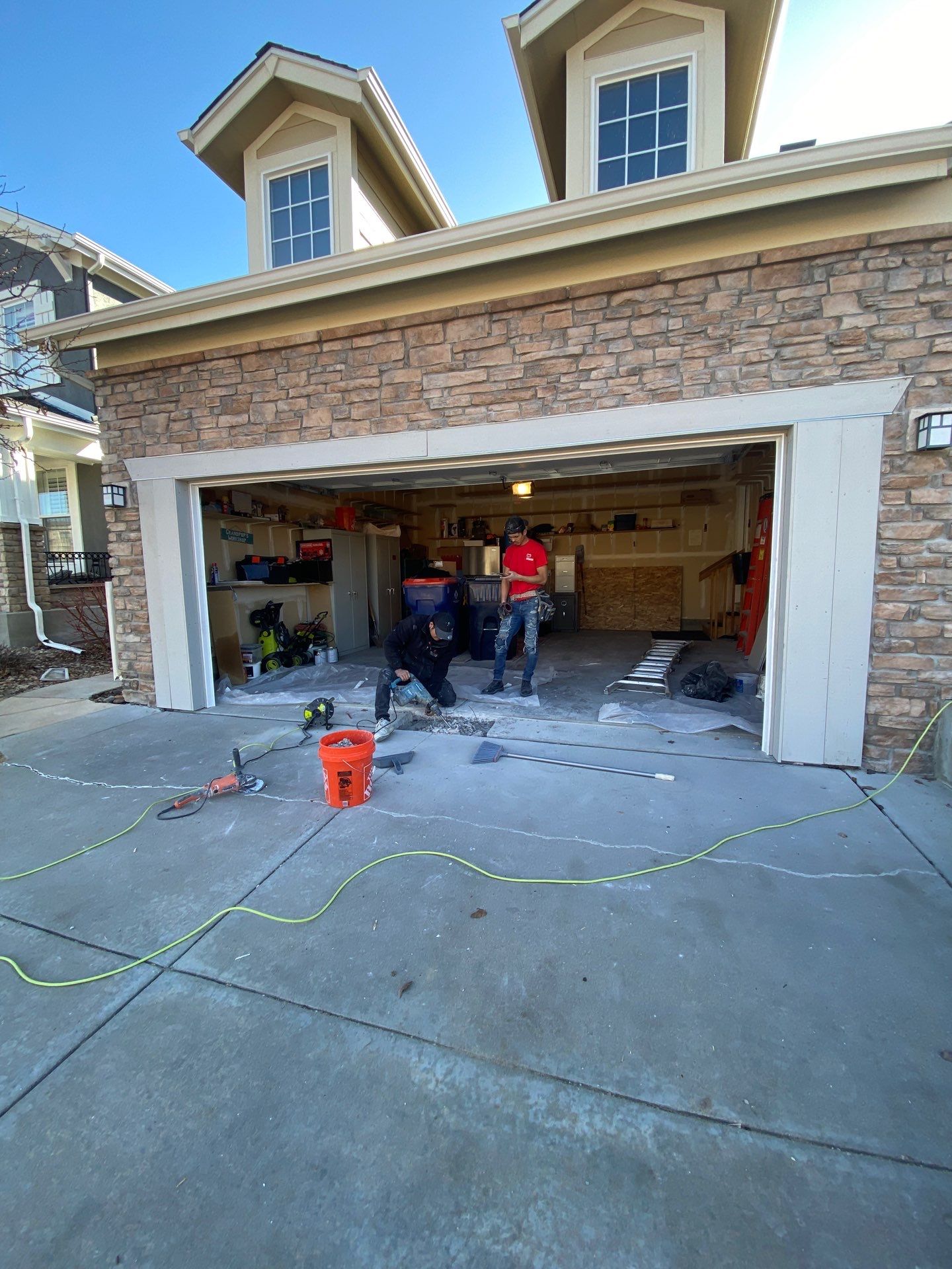 Garage door conversion by David & Goliath Contracting 