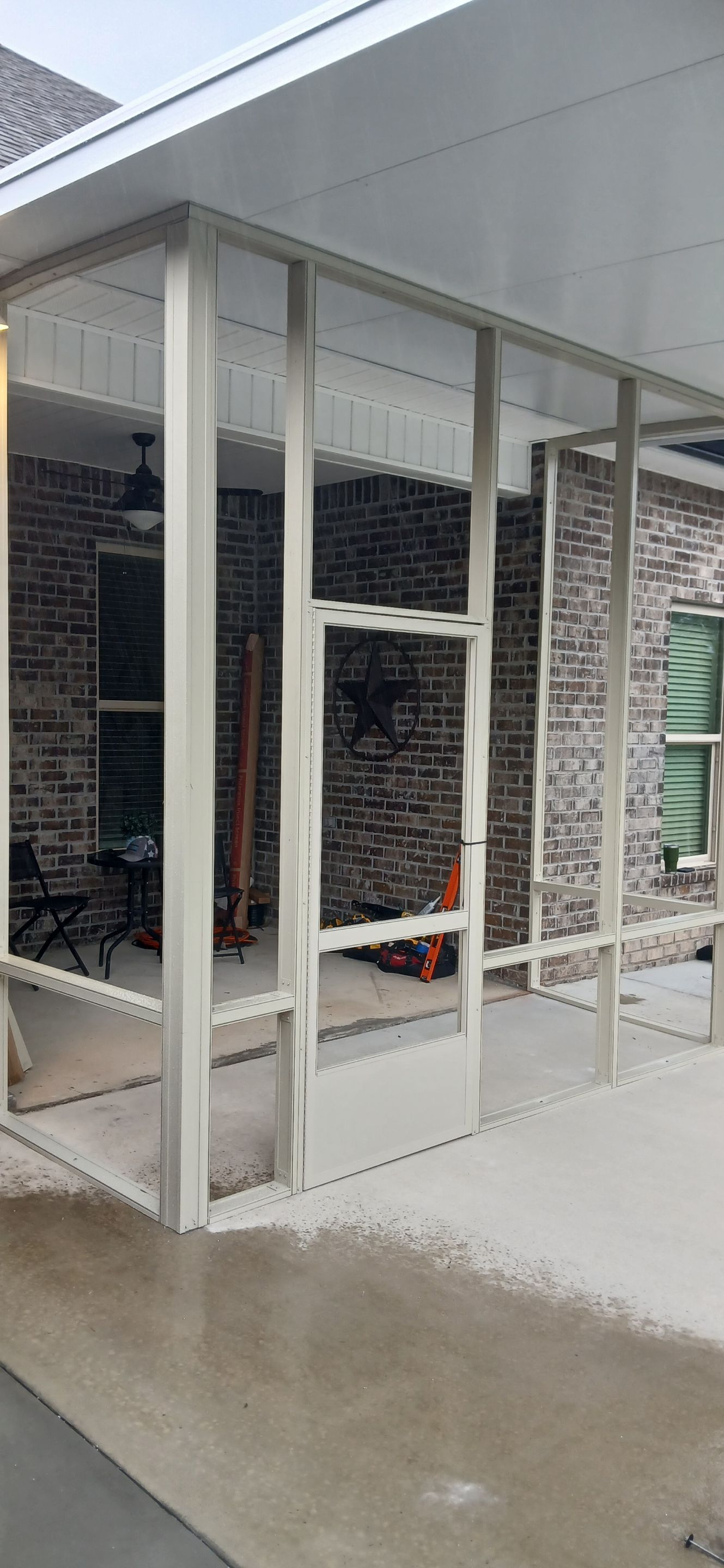 Screenroom Under Existing Canopy by Titan Sunrooms