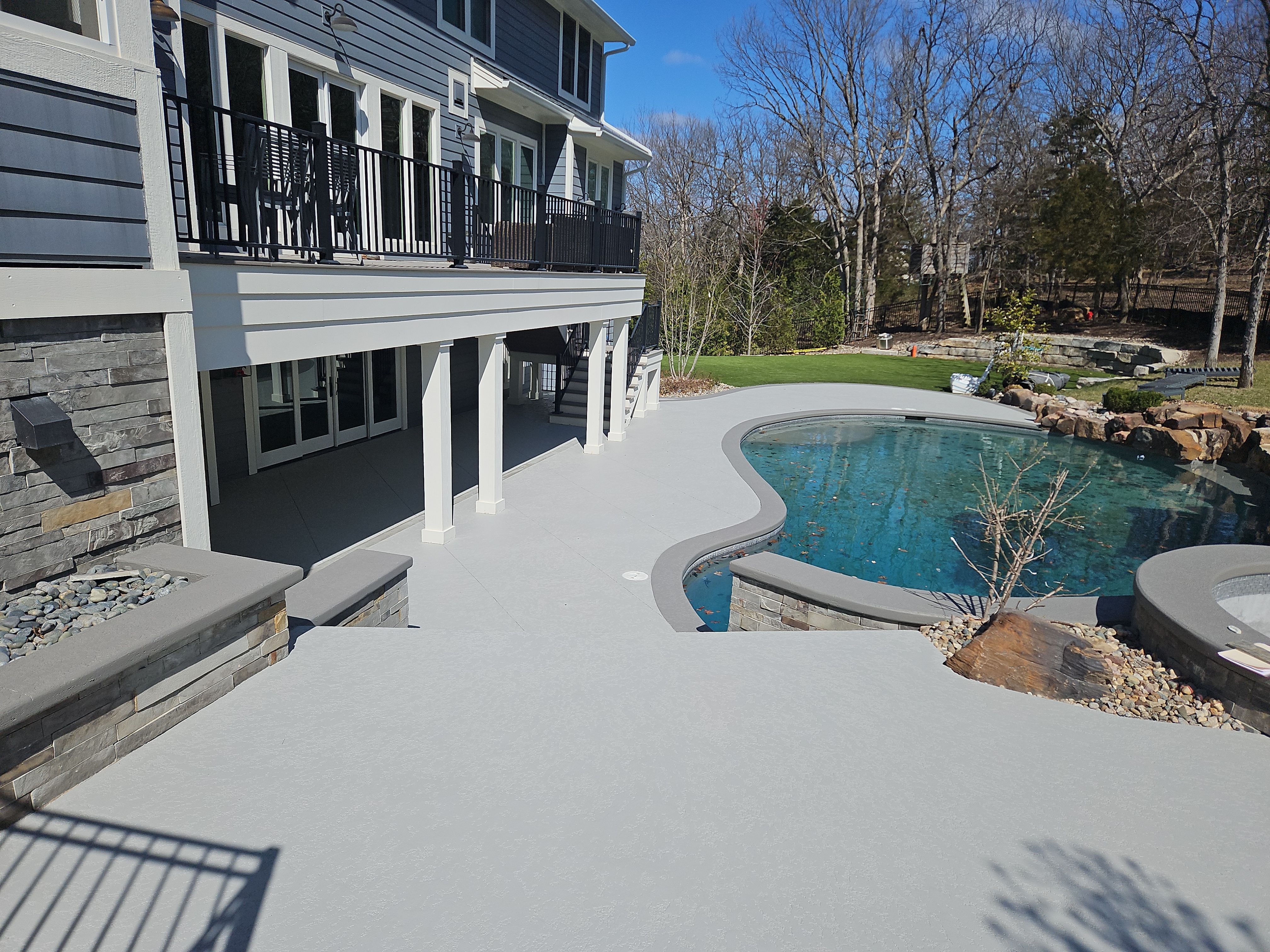 Stilwell, KS -- Pool Deck Resurfacing by Big Red Decorative Concrete, LLC