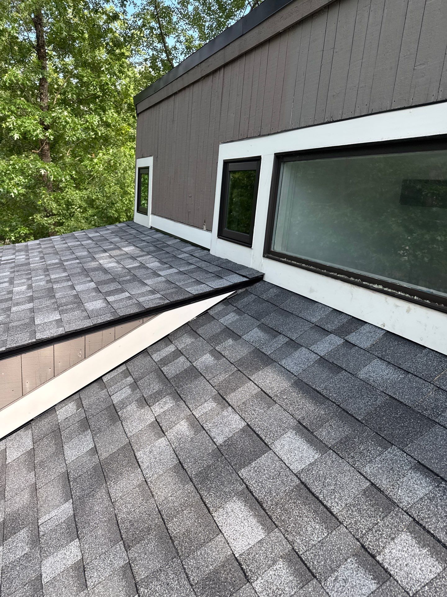 Nashua NH Roof Replacement with Owens Corning Slatestone Gray Shingles, Black Drip Edge, and White AZEK Trim by Compass exteriors