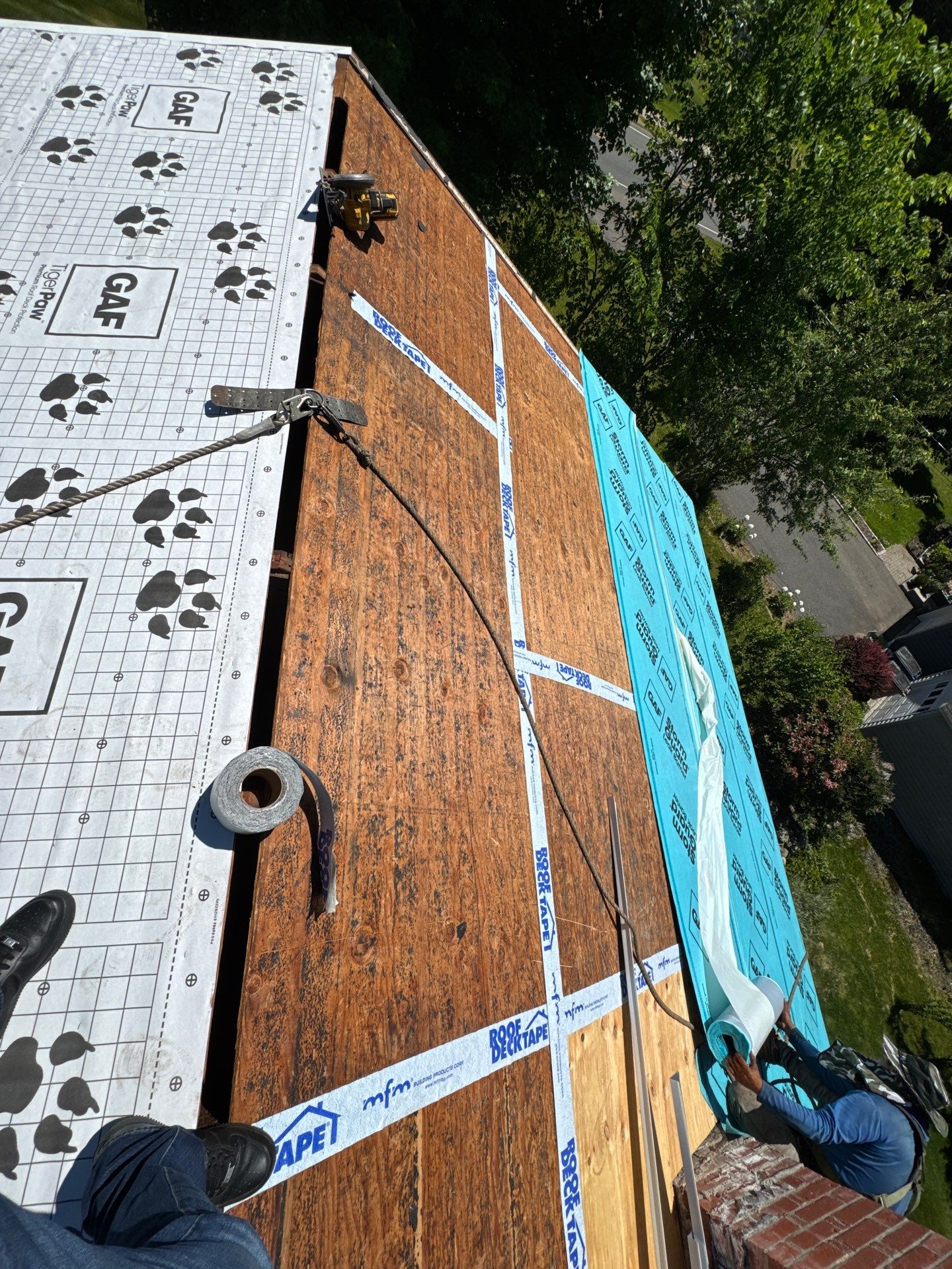 Beautiful new asphalt shingles on a roof in Vernon! by DiGiorgi Roofing and Siding Inc