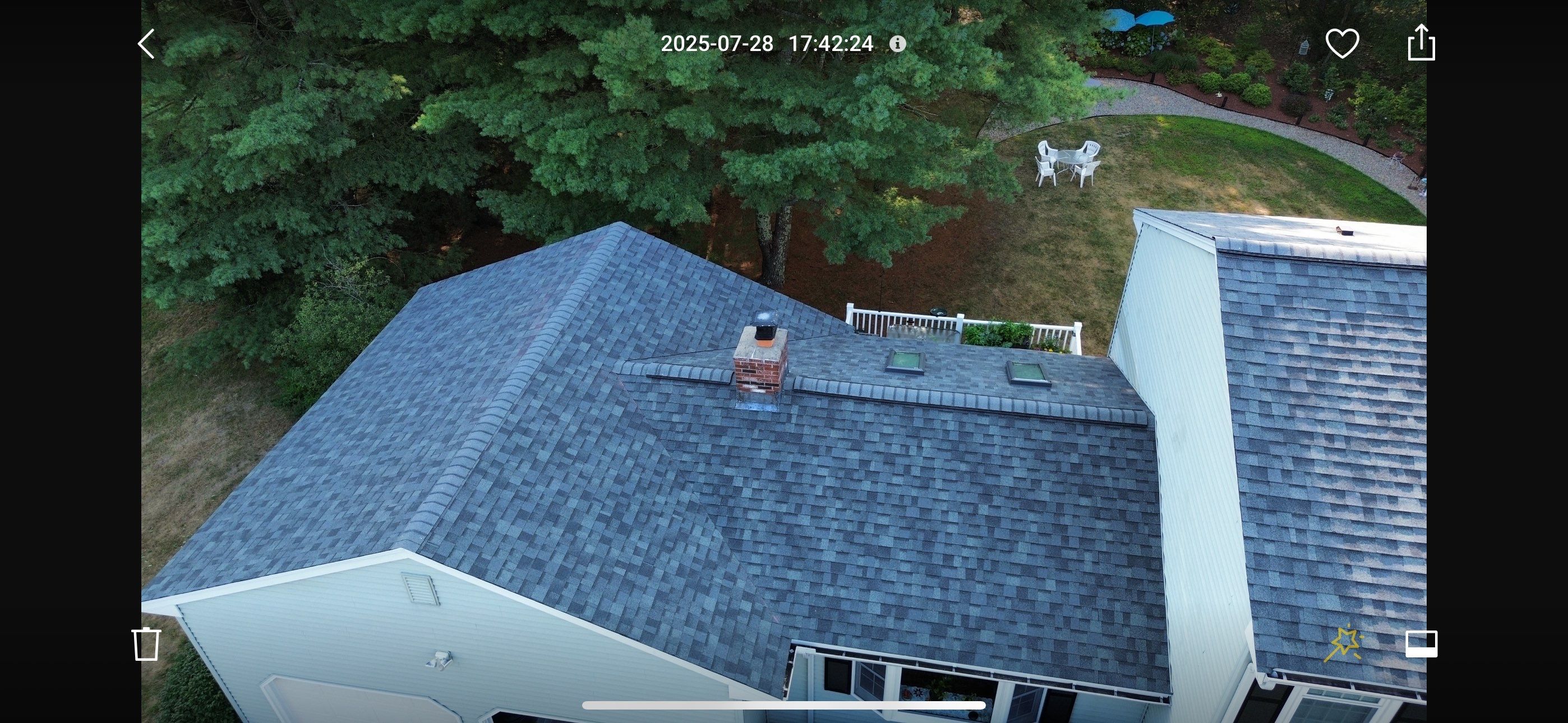 Complete Roof Replacement with Chimney Flashing, Gutter Guard System, and Vinyl Siding Repairs by Mighty Dog Roofing of Greater Middlesex County