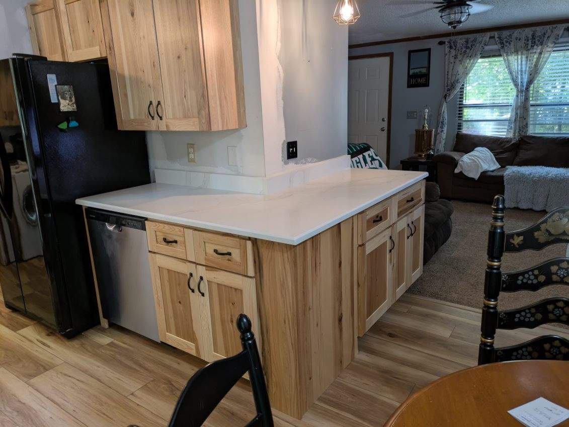 Stunning Kitchen Transformation with Raw Hickory Cabinets by A Step Above Handy LLC 