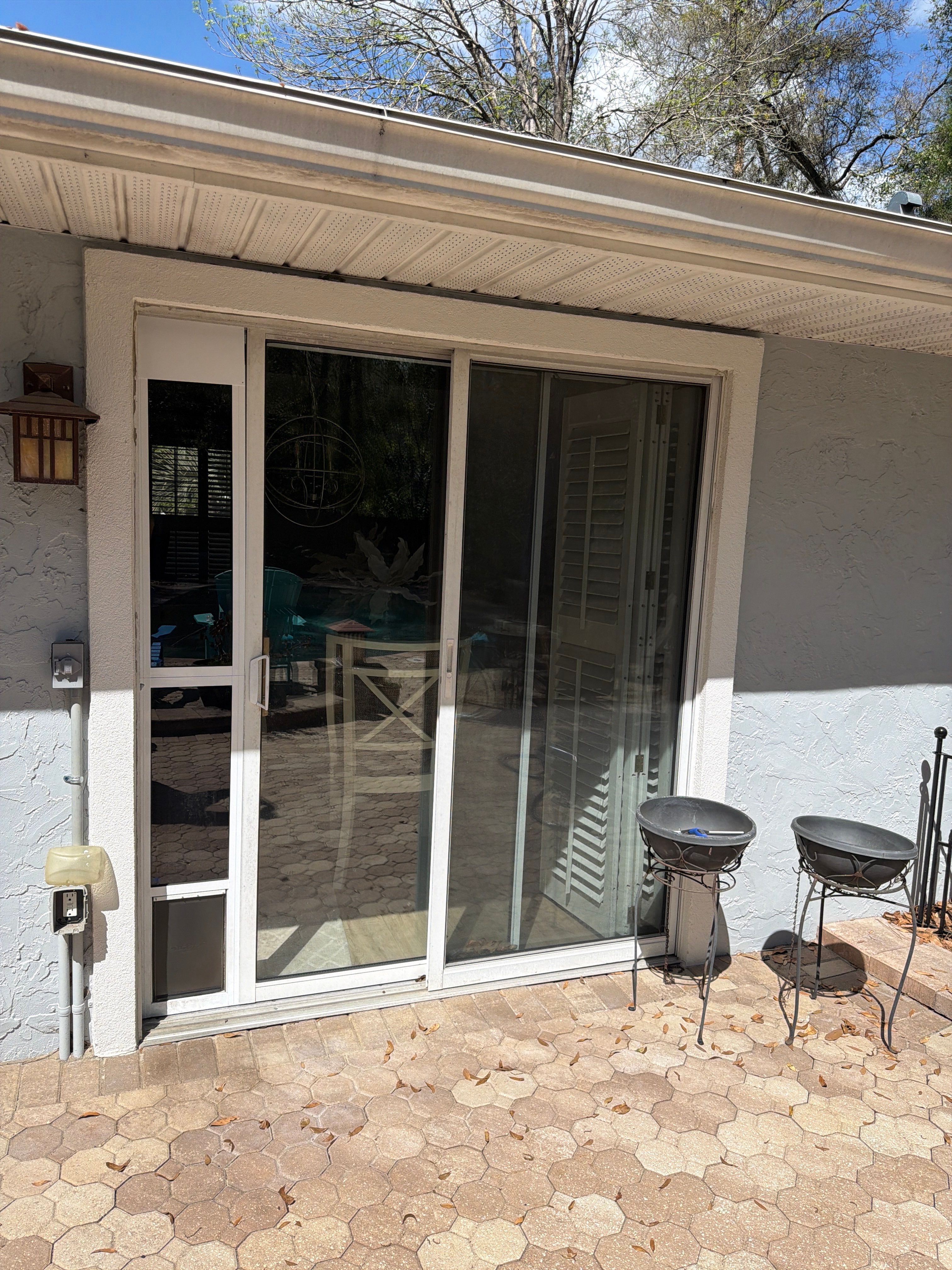 Custom Sliding Glass Door Installation with Integrated Pet Doors in Gainesville by Windows & Doors Store