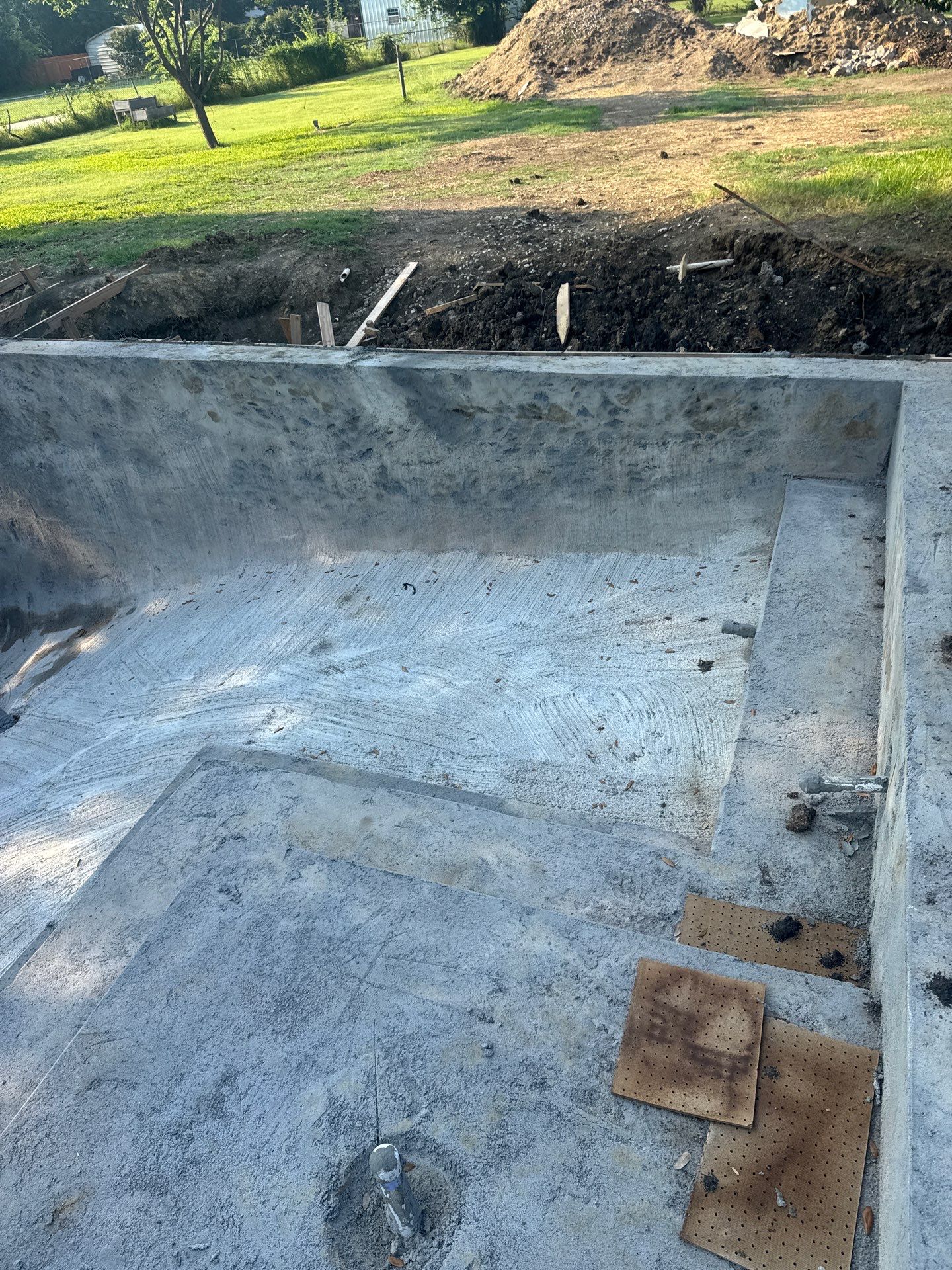 Crisp Geometric Pool with White Coping by Pinnacle Pools and Spas - DFW