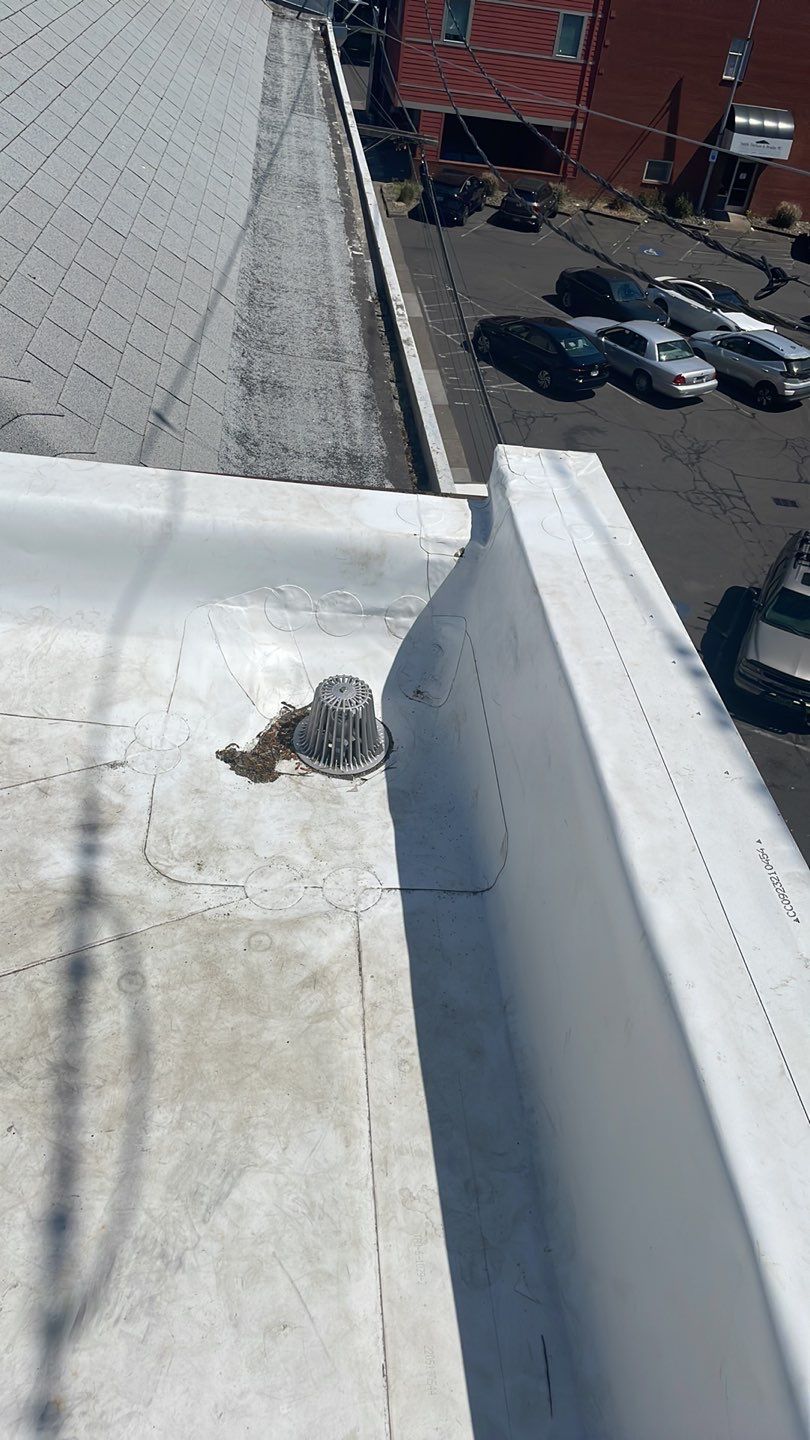 Commercial Flat Roof Installation using GAF 60Mil TPO  by Orezona Building & Roofing Company, Inc.
