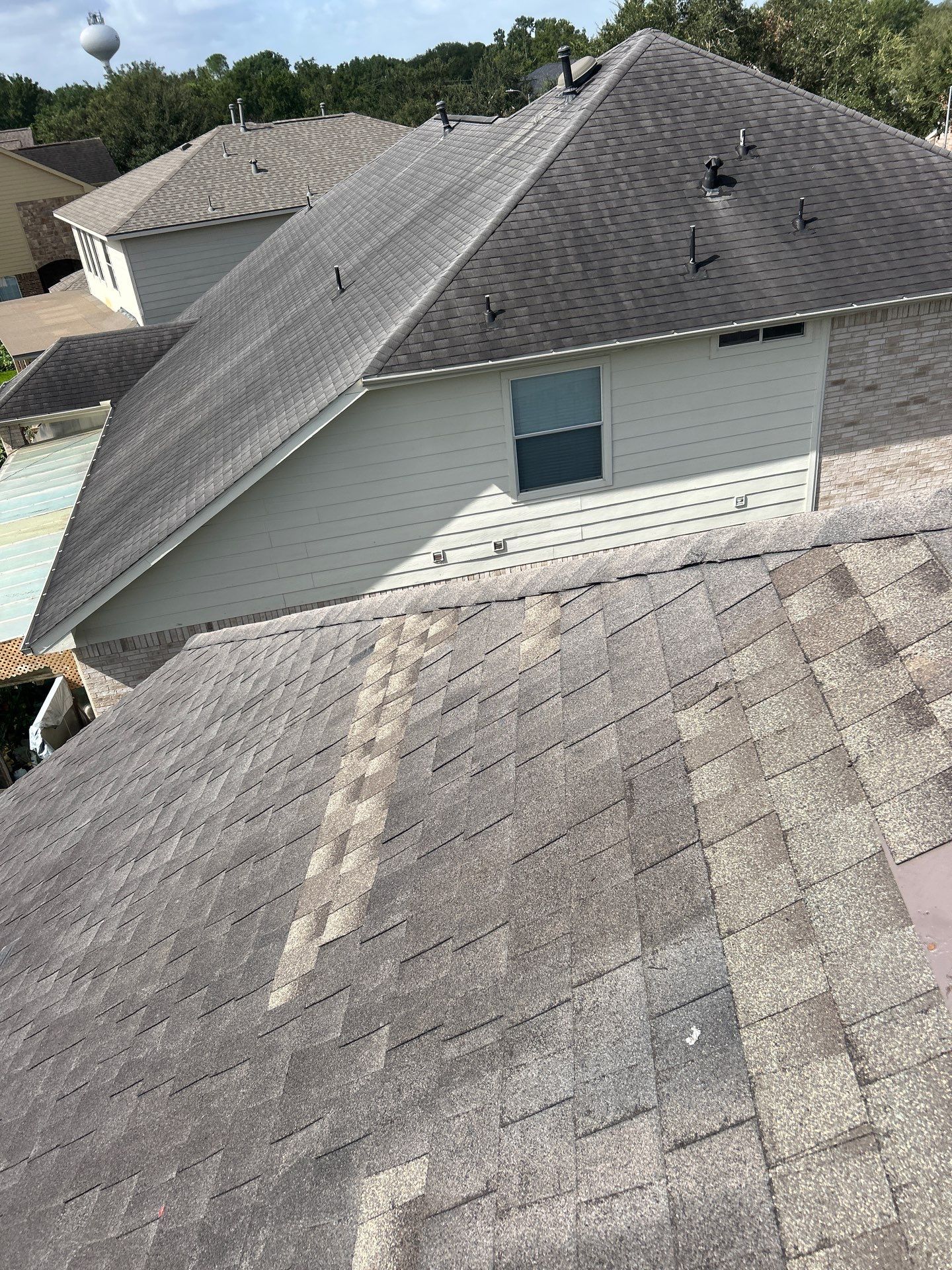 Hail Damage using Owen's Corning Duration (Lifetime) Shingles by Roof Repair Company