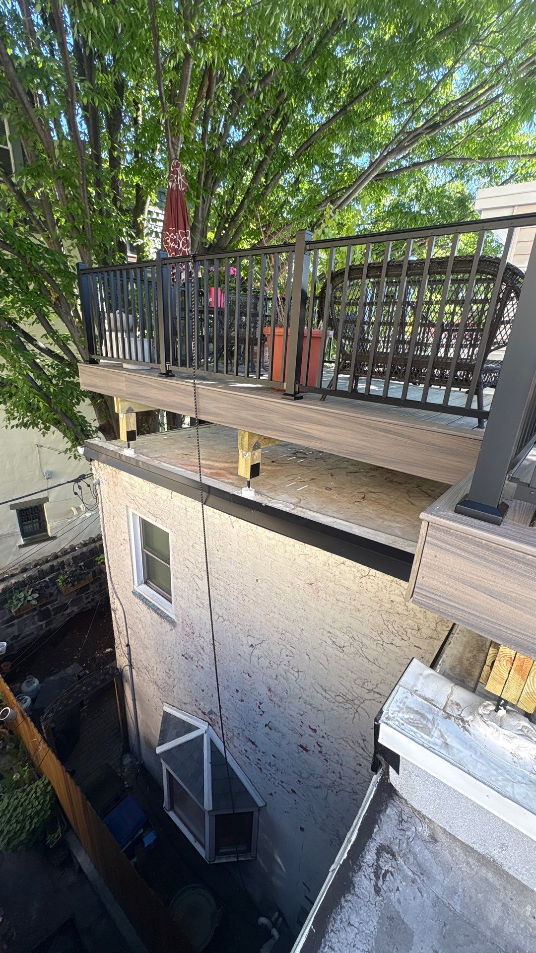 Roof Replacement and Custom Trex Roof Top Deck Project in Philadelphia, Pennsylvania by Philadelphia Quality Roofing