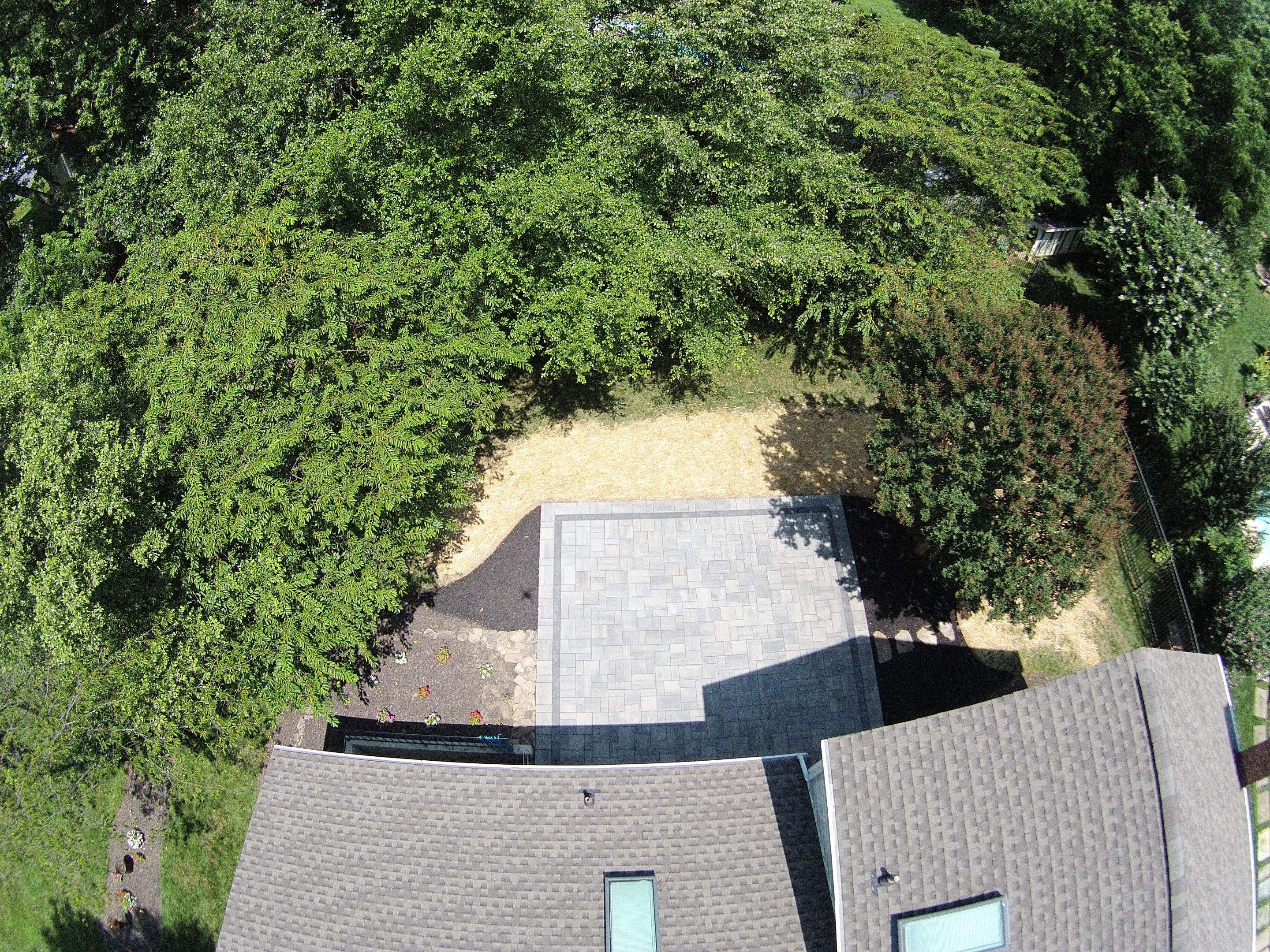 Backyard Transformation using Techo-Bloc Pavers by The Smet Companies, LLC