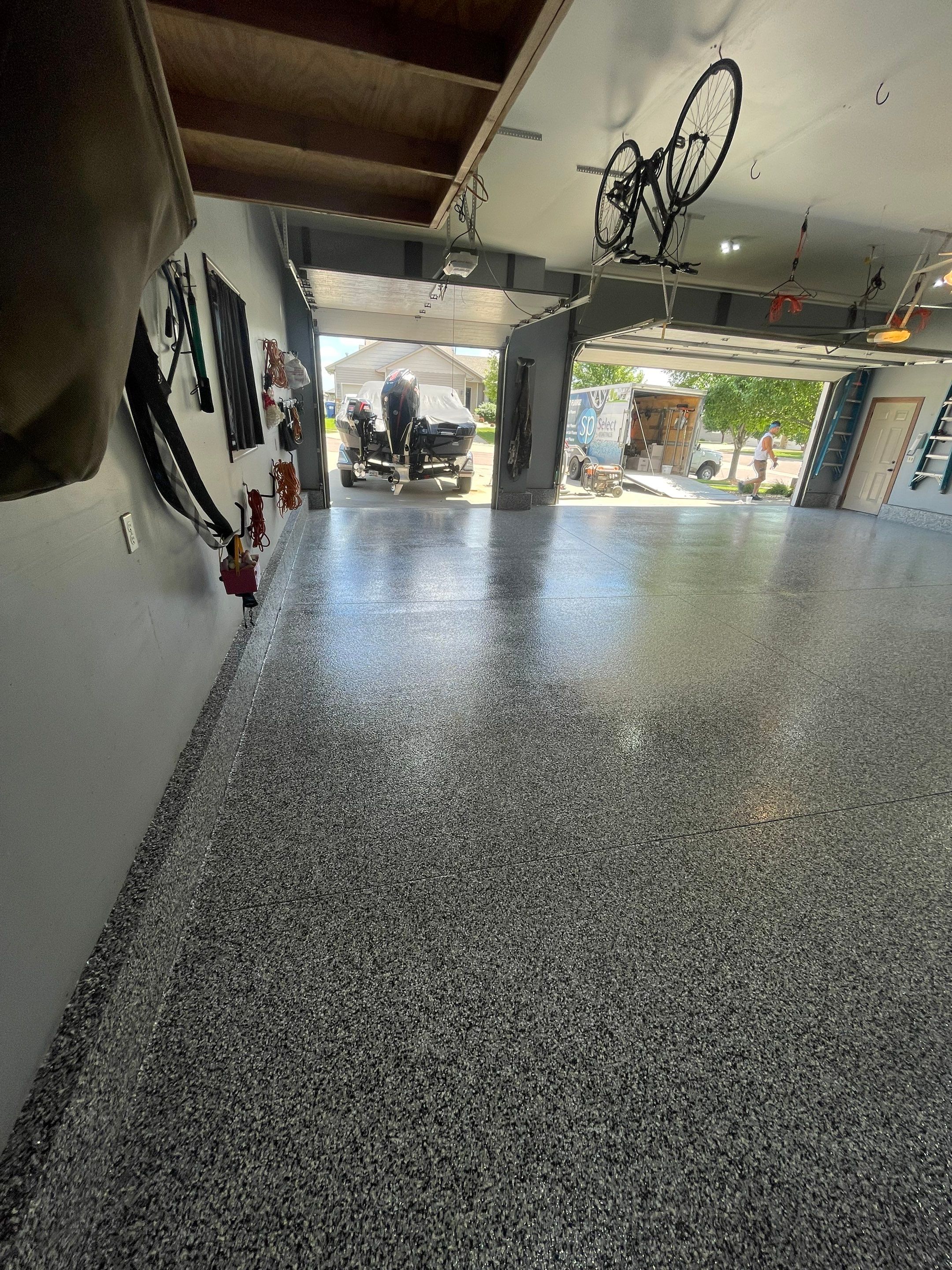 Residential Garage Floor Coating in Sioux Falls by Select Painting, Coatings & Garage Cabinets