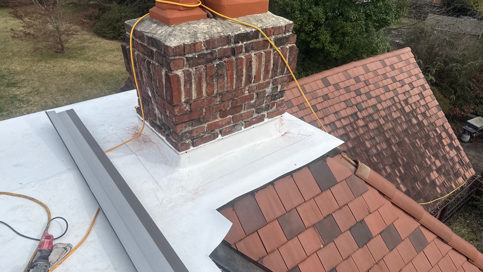 Flat Roof TPO Overlay on Clay Tile Home – Memphis, TN by Cool Roofs