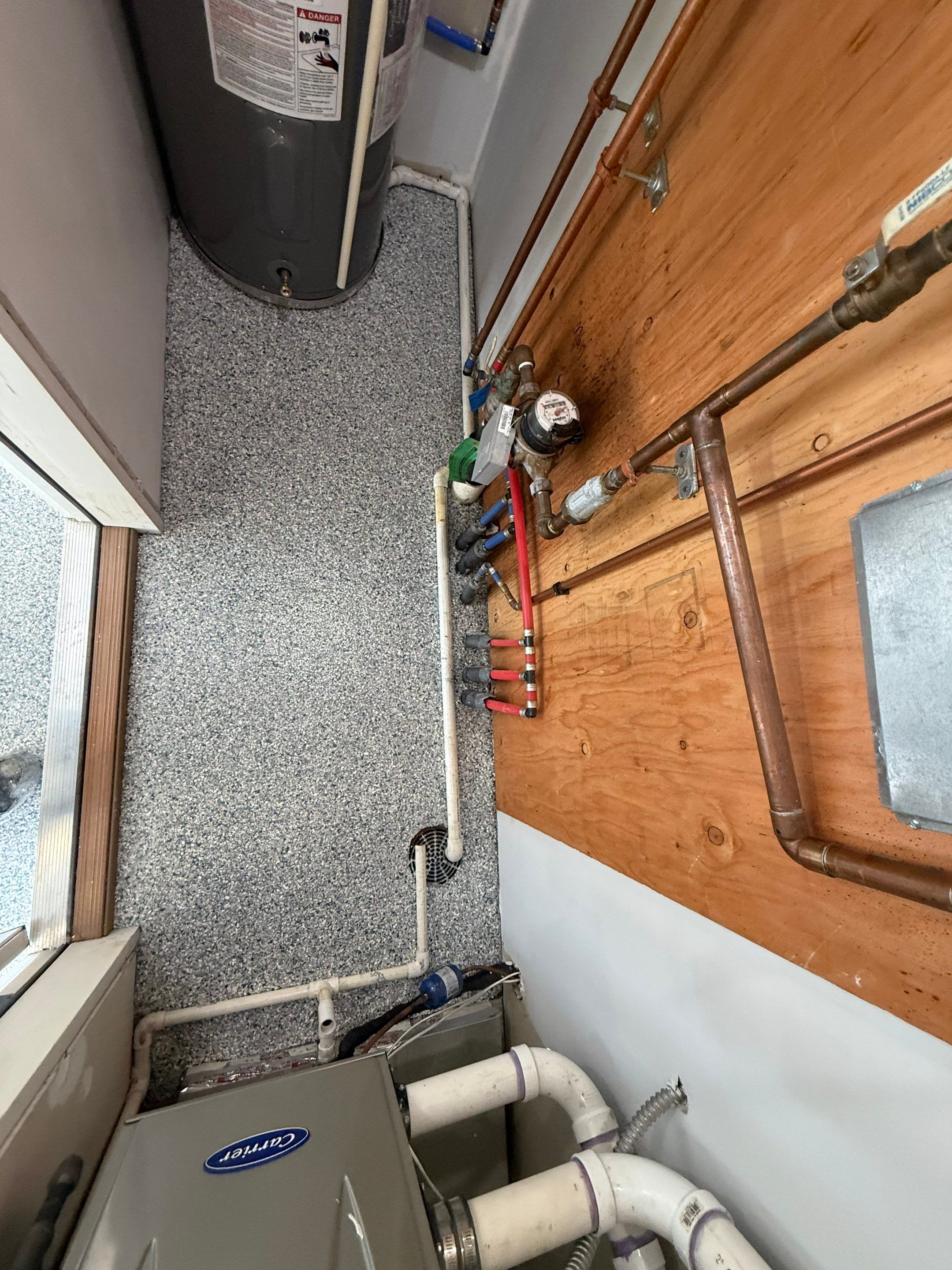 Decorative Chip Epoxy Floor Coating Installation in Sioux Falls by Select Painting, Coatings & Garage Cabinets