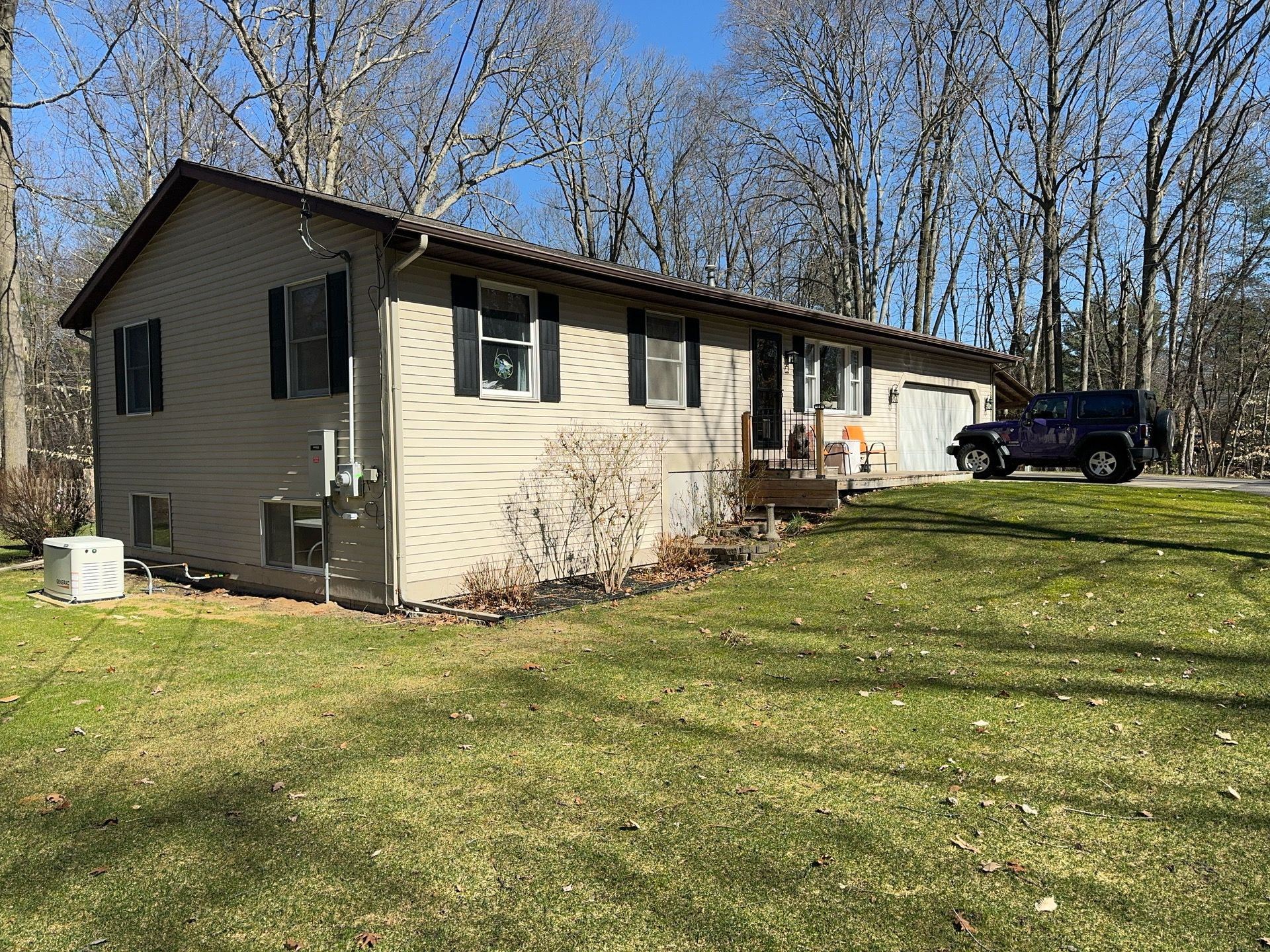 Siding, Deck and Versetta Stone by Avalon Roofing and Exteriors